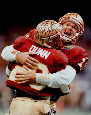 Danny Kanell and Warrick Dunn celebrate after routing the Canes in '95.