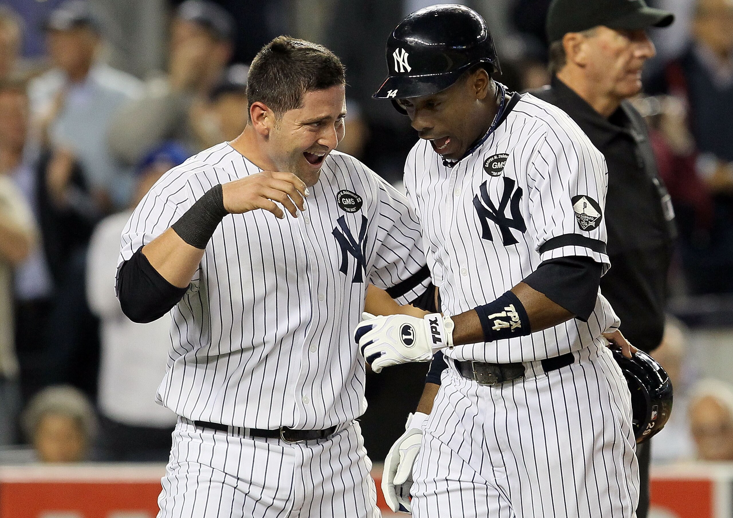 NEW YORK - SEPTEMBER 20: Curtis Granderson #14 of the New York Yankees celebrates his third inning two run home run against the Tampa Bay Rays with teammate Francisco Cervelli #29 on September 20, 2010 at Yankee Stadium in the Bronx borough of New York C NEW YORK - SEPTEMBER 20: Curtis Granderson #14 of the New York Yankees celebrates his third inning two run home run against the Tampa Bay Rays with teammate Francisco Cervelli #29 on September 20, 2010 at Yankee Stadium in the Bronx borough of New York C
