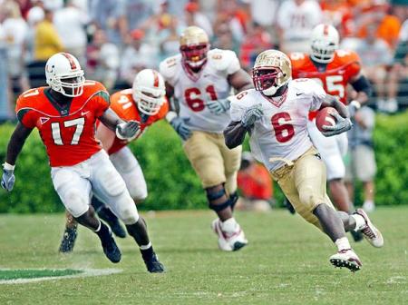 Greg Jones runs over the entire Miami football team--one player at a time--in '02.