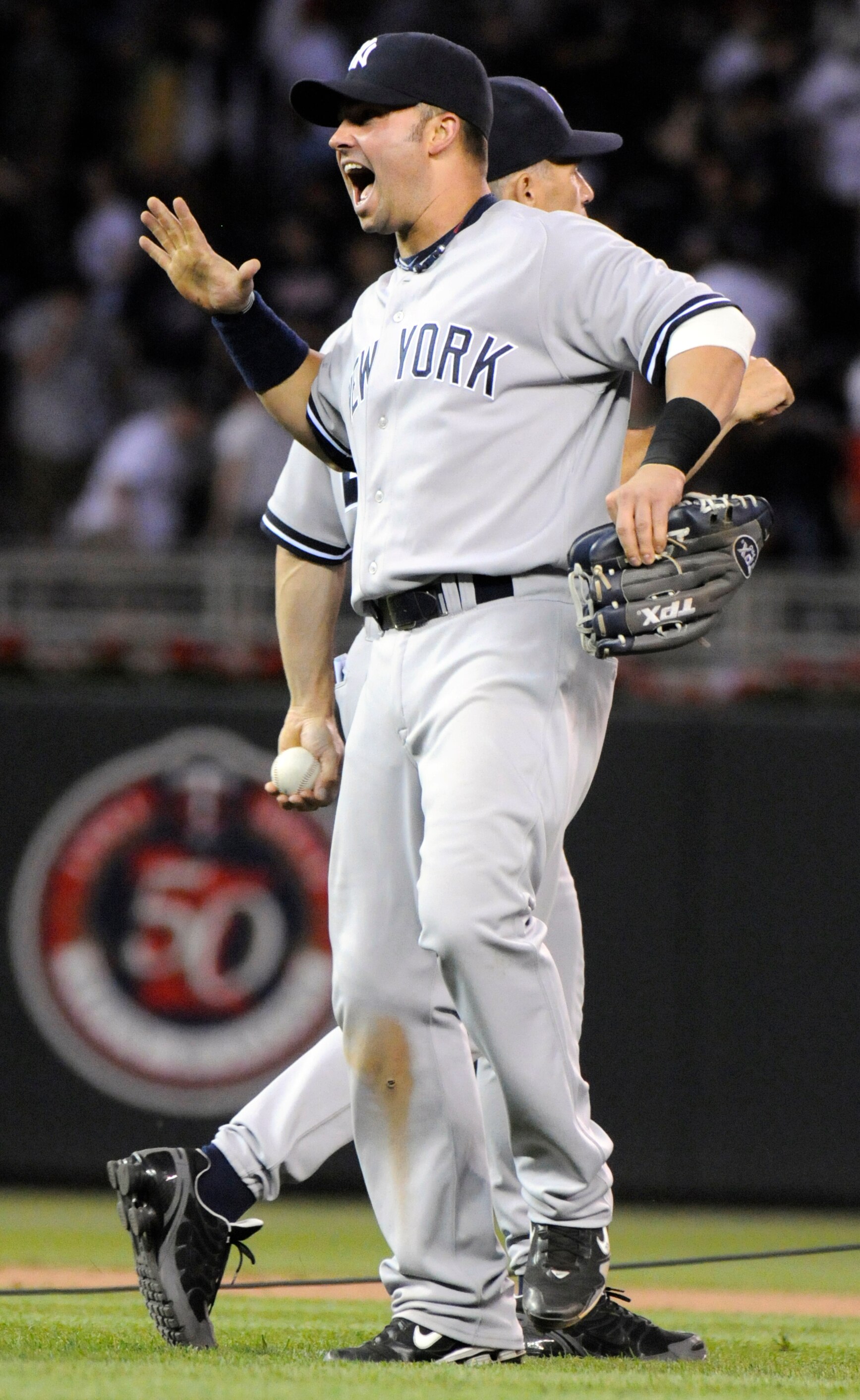 MINNEAPOLIS, MN - MAY 26: Nick Swisher #33 of the New York Yankees celebrates a 3-2 win against the Minnesota Twins following their game on May 26, 2010 at Target Field in Minneapolis, Minnesota. (Photo by Hannah Foslien /Getty Images)