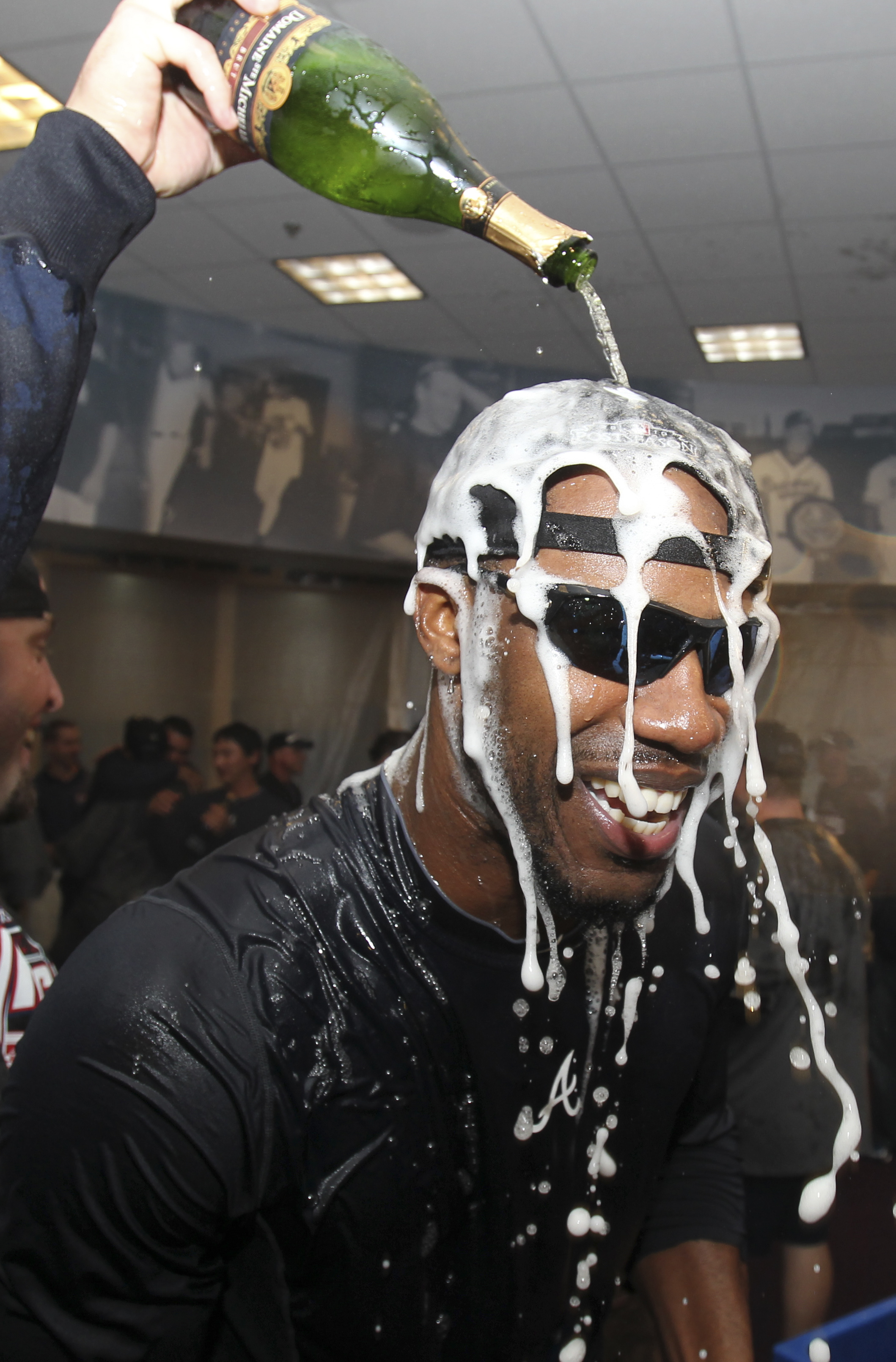 ATLANTA - OCTOBER 03:  Outfielder Jason Heyward #22 of the Atlanta Braves celebrates after the Braves clinch the National League Wildcard after the game against the Philadelphia Phillies at Turner Field on October 3, 2010 in Atlanta, Georgia.  The Braves 