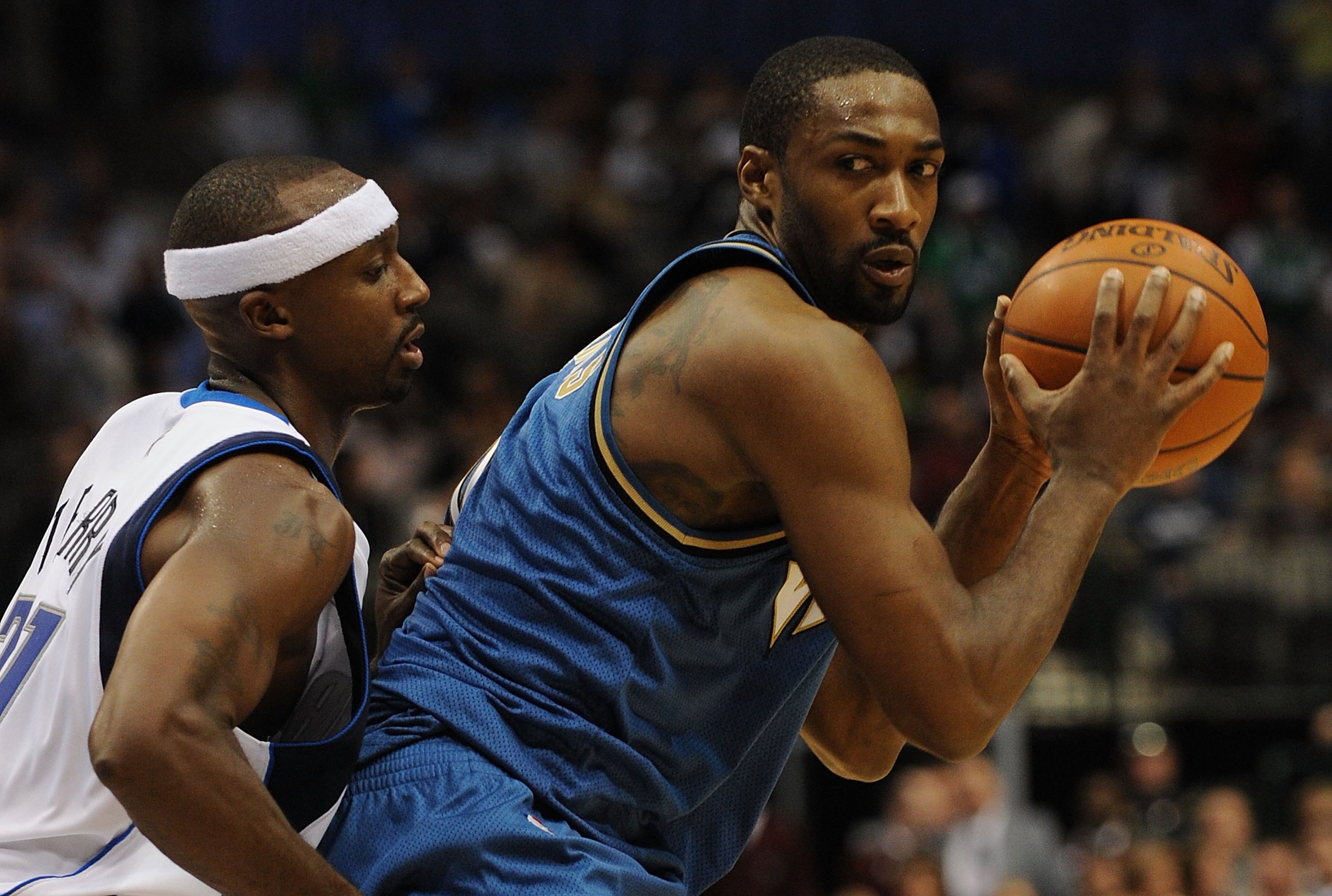DALLAS - OCTOBER 27:  Gilbert Arenas #0 of the Washington Wizards dribbles the ball against Jason Terry #31 of the Dallas Mavericks on October 27, 2009 at American Airlines Center in Dallas, Texas.  NOTE TO USER: User expressly acknowledges and agrees tha