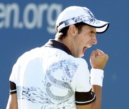 Novak Djokovic saved two match points to withstand Roger Federer 5-7 6-1 5-7 6-2 7-5.