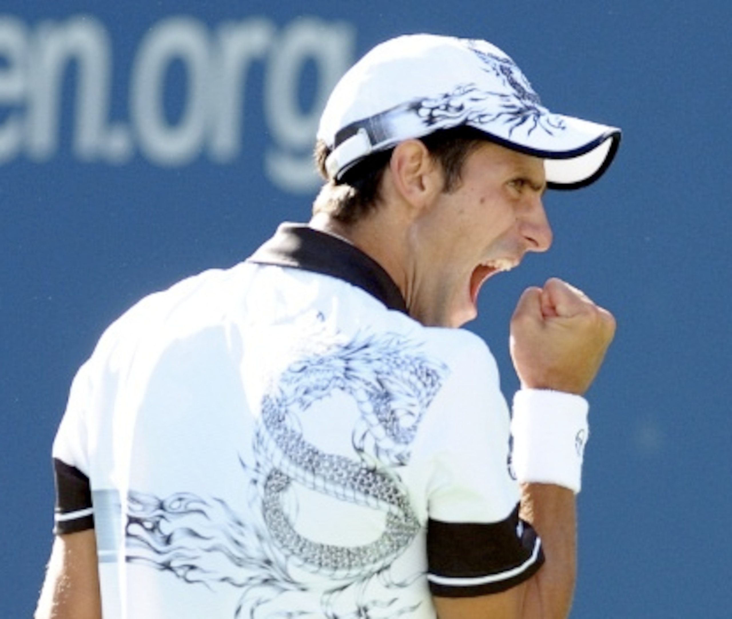 Novak Djokovic saved two match points to withstand Roger Federer 5-7 6-1 5-7 6-2 7-5.