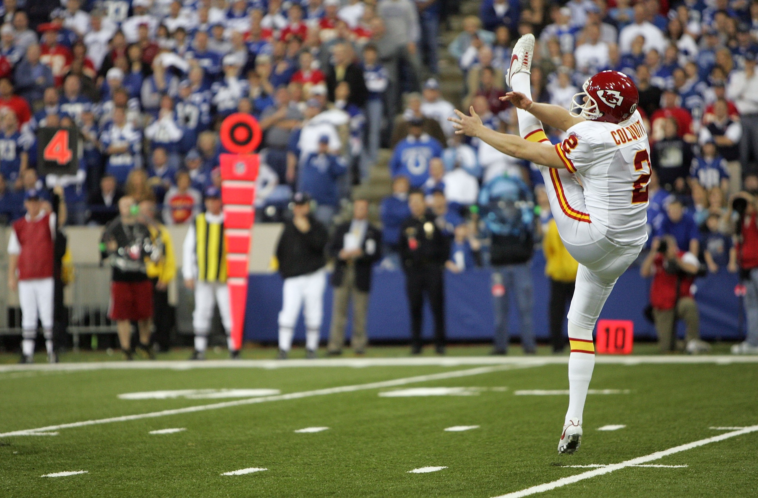 INDIANAPOLIS - JANUARY 06:  Punter Dustin Colquitt #2 of the Kansas City Chiefs follows through on a punt against the Indianapolis Colts during their AFC Wild Card Playoff Game January 6, 2007 at RCA Dome in Indianapolis, Indiana. The Colts won 23-8.  (Ph