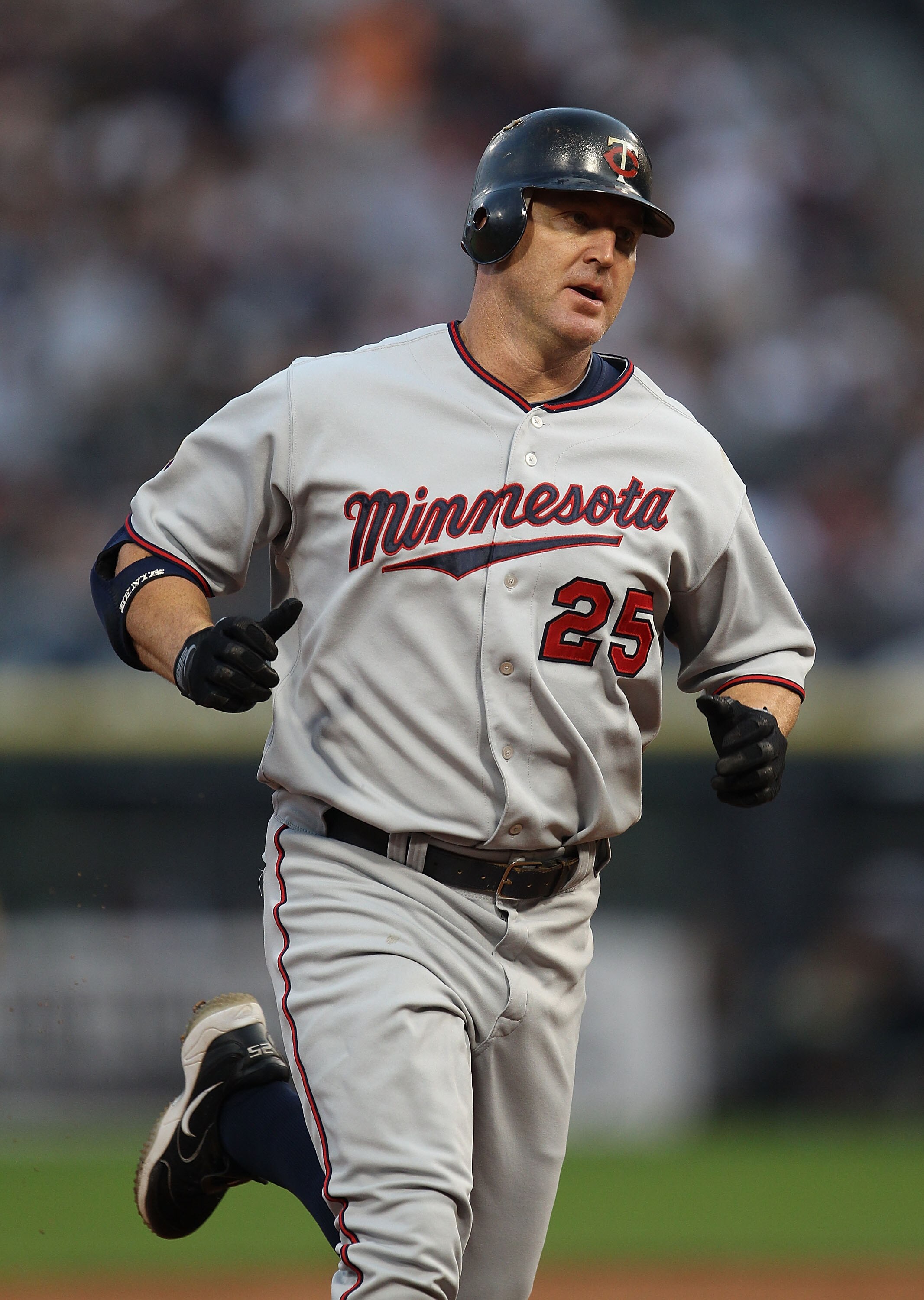 CHICAGO - AUGUST 10: Jim Thome #25 of the Minnesota Twins runs the bases after his 1st inning home run against the Chicago White Sox at U.S. Cellular Field on August 10, 2010 in Chicago, Illinois. The Twins defeated the White Sox 12-6. (Photo by Jonathan 