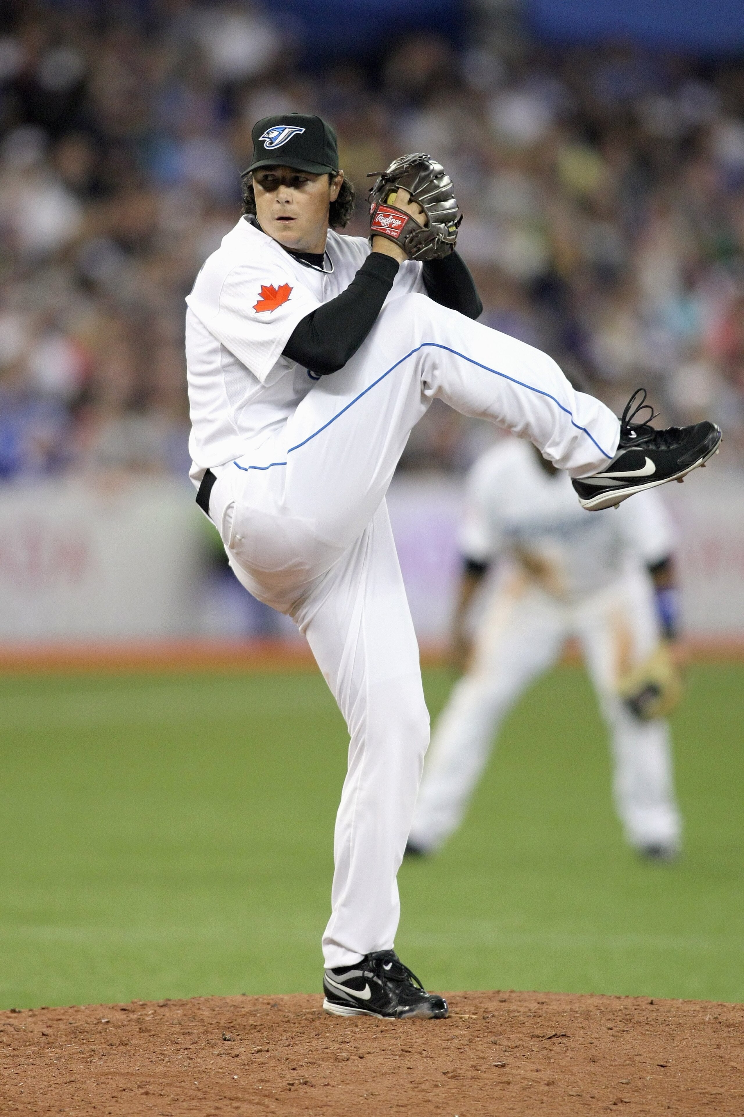 TORONTO - APRIL 12:  Scott Downs #37 of the Toronto Blue Jays pitches during the game against the Chicago White Sox at the Rogers Centre on April 12, 2010 in Toronto, Ontario. (Photo By Dave Sandford/Getty Images)