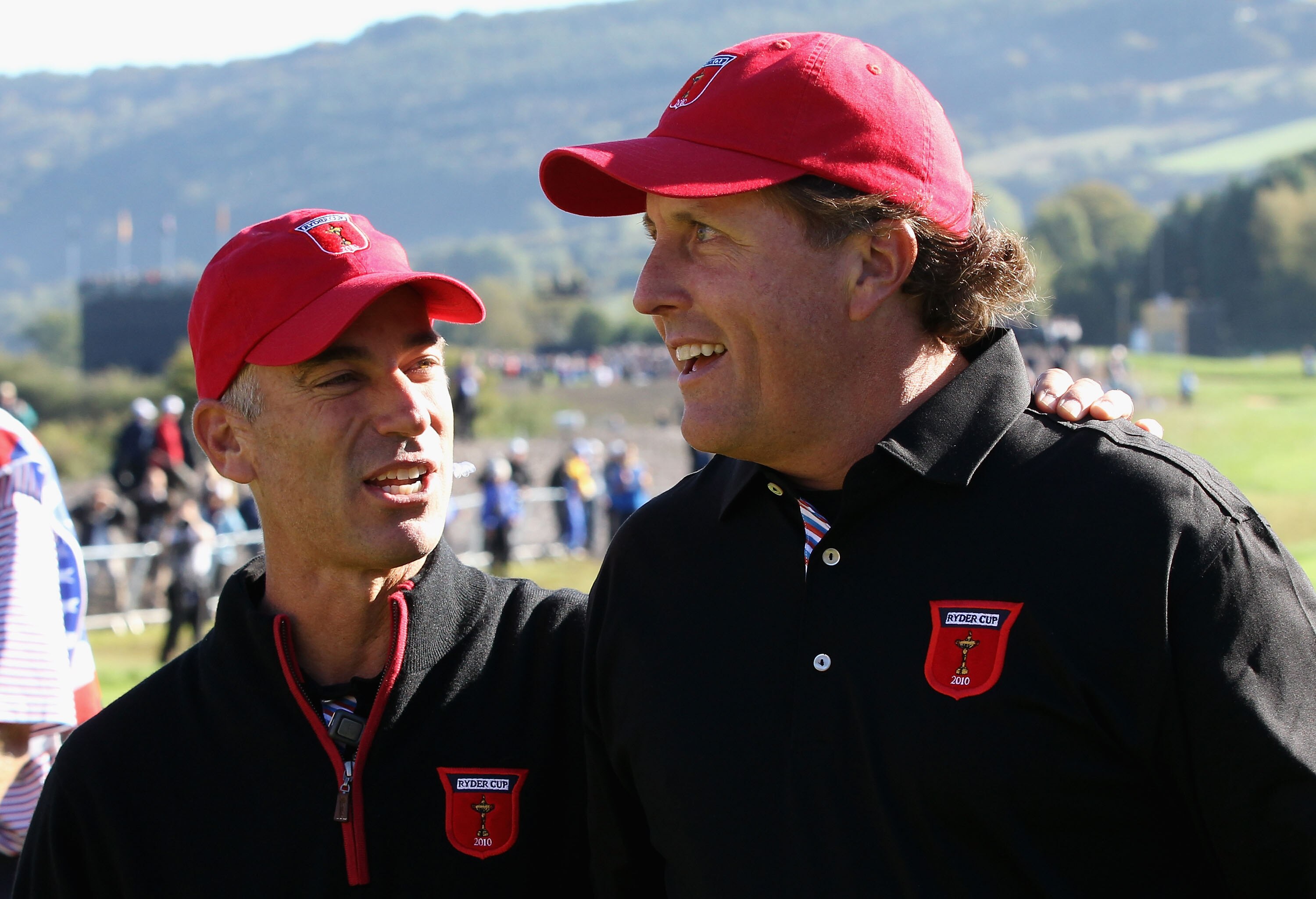 NEWPORT, WALES - OCTOBER 04:  USA Team Captain Corey Pavin (L) greets Phil Mickelson on the first tee in the singles matches during the 2010 Ryder Cup at the Celtic Manor Resort on October 4, 2010 in Newport, Wales.  (Photo by David Cannon/Getty Images)
