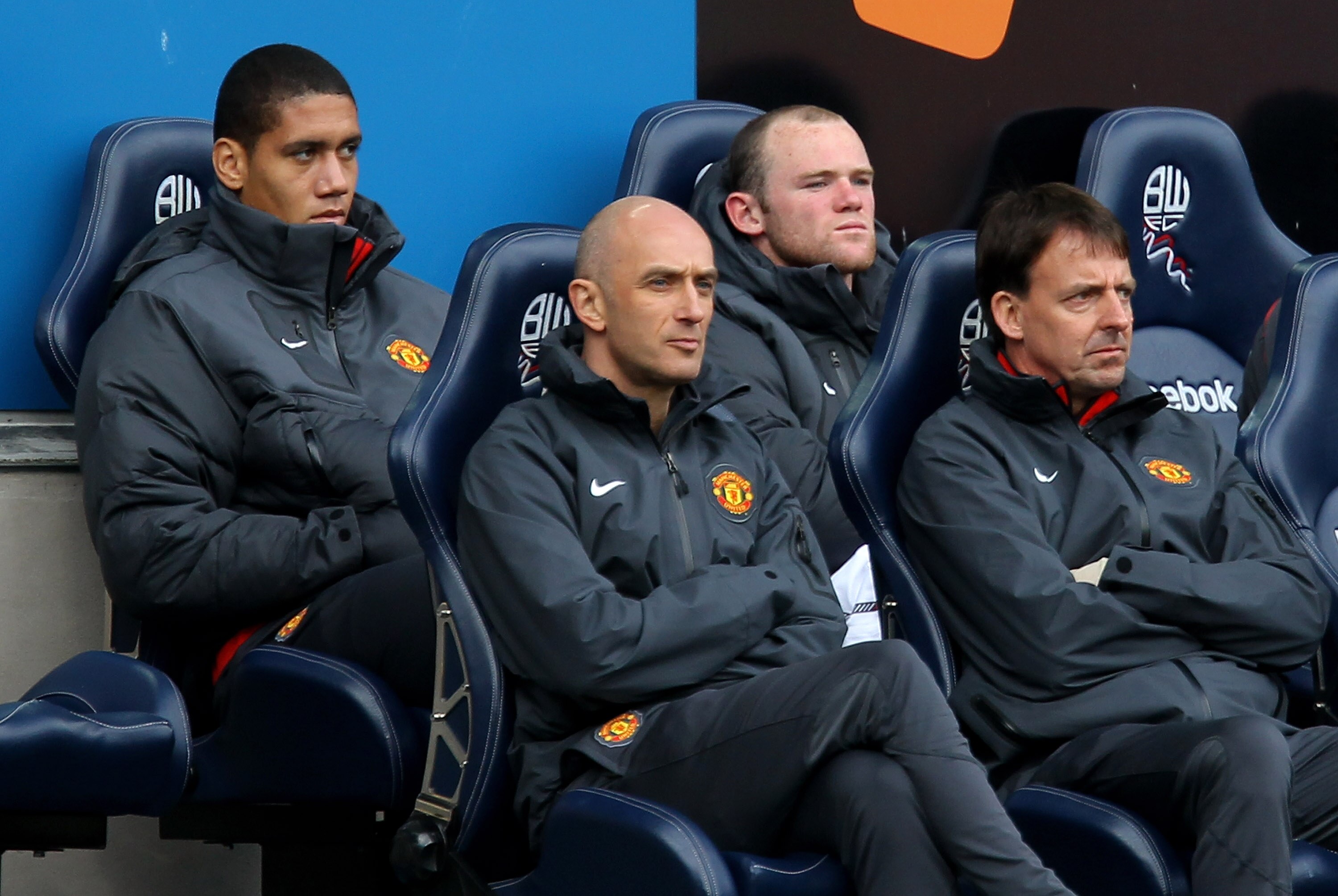 BOLTON, ENGLAND - SEPTEMBER 26:  Wayne Rooney of Manchester United watches from the bench after being substituted during the Barclays Premier League match between Bolton Wanderers and Manchester United at the Reebok Stadium on September 26, 2010 in Bolton