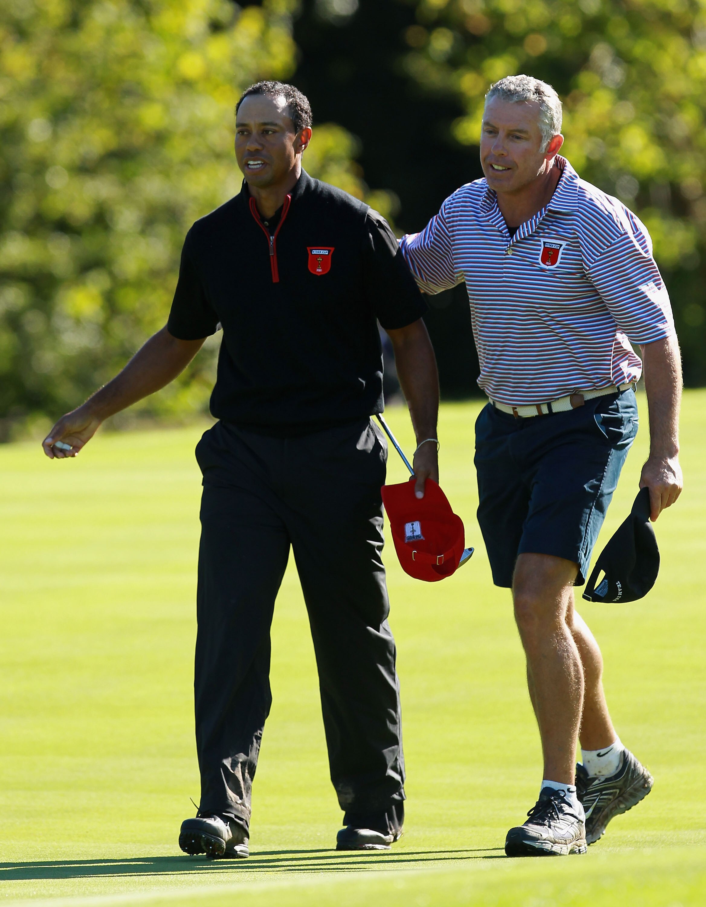 NEWPORT, WALES - OCTOBER 04:  Tiger Woods of the USA with his caddie Steve Williams on the 15th green in the singles matches during the 2010 Ryder Cup at the Celtic Manor Resort on October 4, 2010 in Newport, Wales.  (Photo by Andrew Redington/Getty Image
