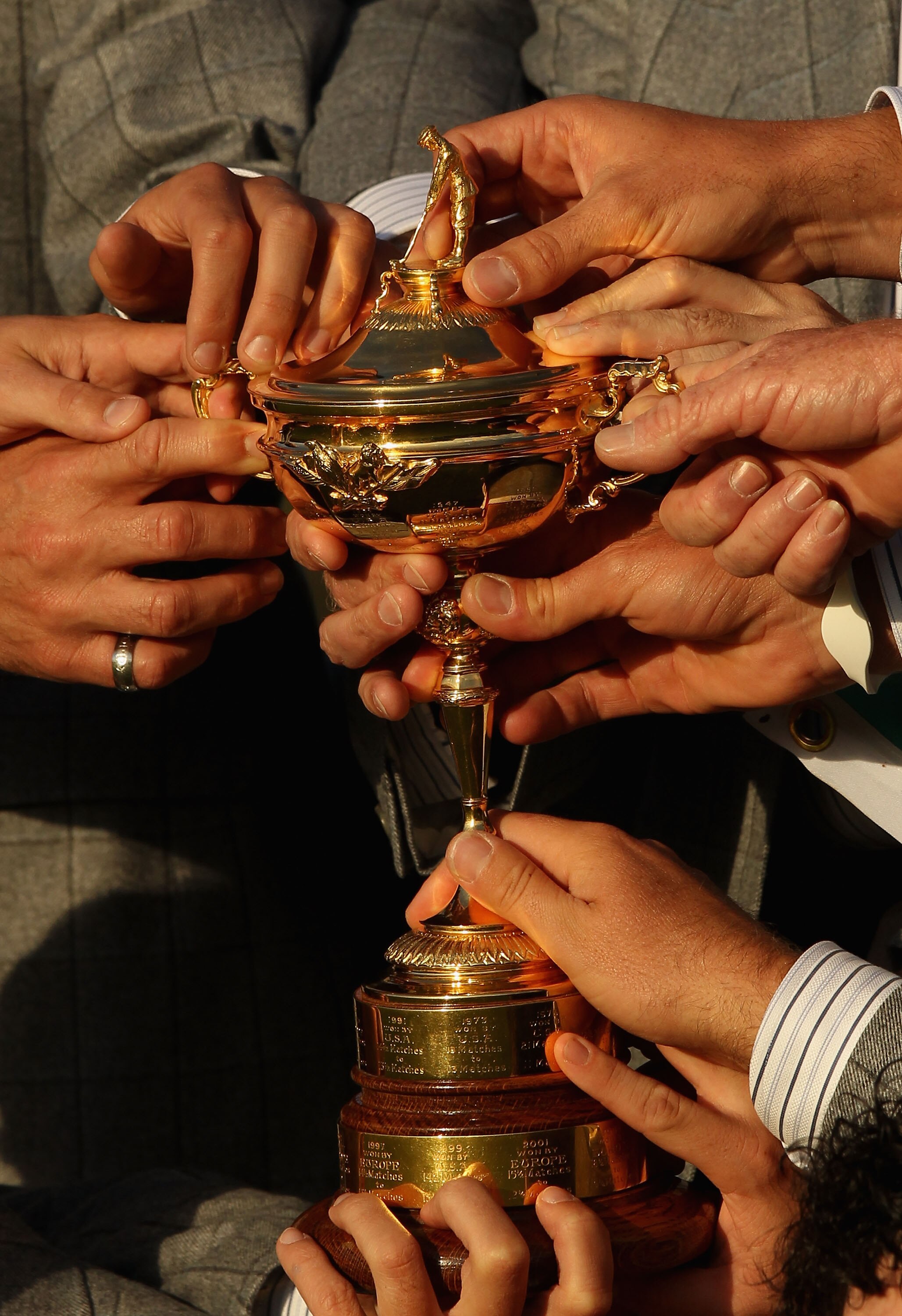 NEWPORT, WALES - OCTOBER 04:  A detail shot of the members of the European Team with the Ryder Cup following Europe's 14.5 to 13.5 victory over the USA at the 2010 Ryder Cup at the Celtic Manor Resort on October 4, 2010 in Newport, Wales.  (Photo by Ross