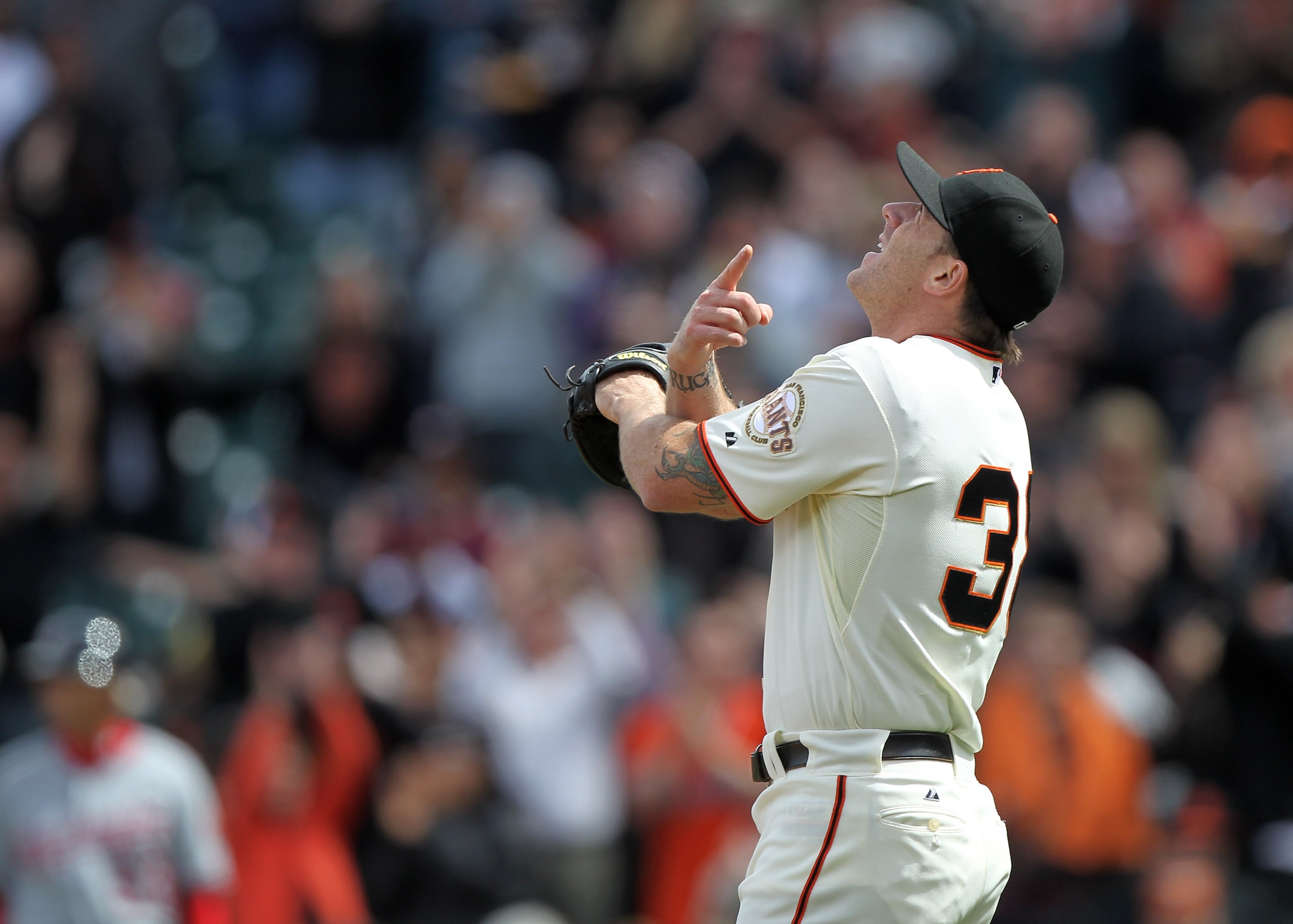 SAN FRANCISCO - MAY 27:  Brain Wilson #38 of the San Francisco Giants celebrates after defeating the Washington Nationals during an MLB game at AT&T Park on May 27, 2010 in San Francisco, California.  (Photo by Jed Jacobsohn/Getty Images)