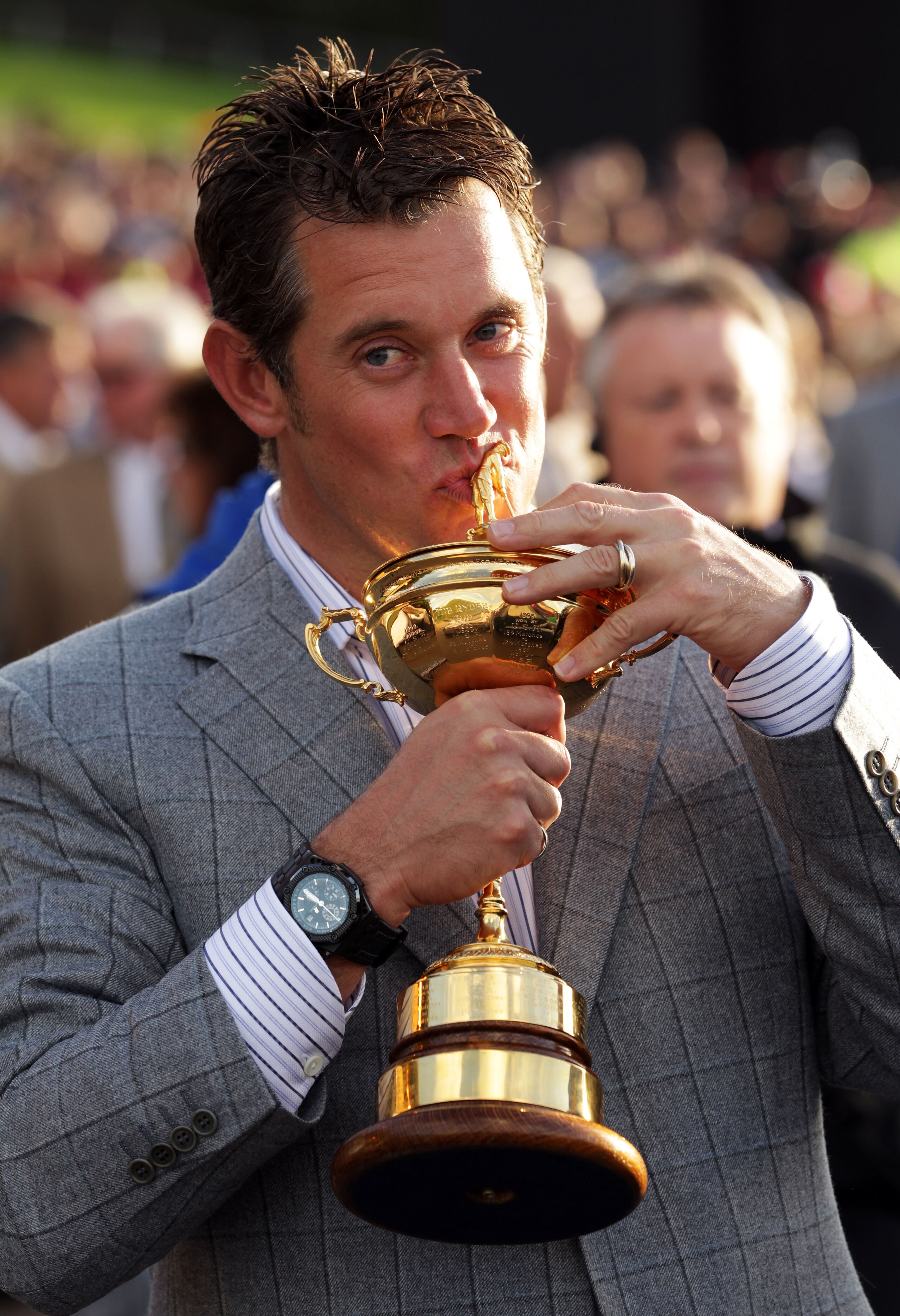 NEWPORT, WALES - OCTOBER 04:  European Team member Lee Westwood kisses the Ryder Cup following Europe's 14.5 to 13.5 victory over the USA at the 2010 Ryder Cup at the Celtic Manor Resort on October 4, 2010 in Newport, Wales.  (Photo by Andrew Redington/Ge