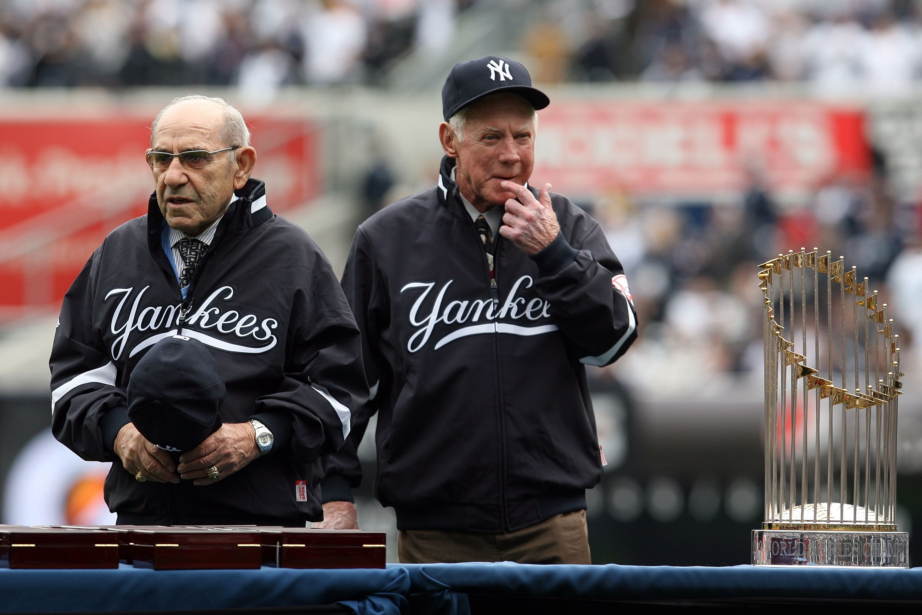 NEW YORK - APRIL 13:  Yankee legends and Baseball Hall of Famers Yogi Berra (L) and Whitey Ford look on before presenting the New York Yankees with their World Series ring for the 2009 season prior to playing against the Los Angeles Angels of Anaheim duri