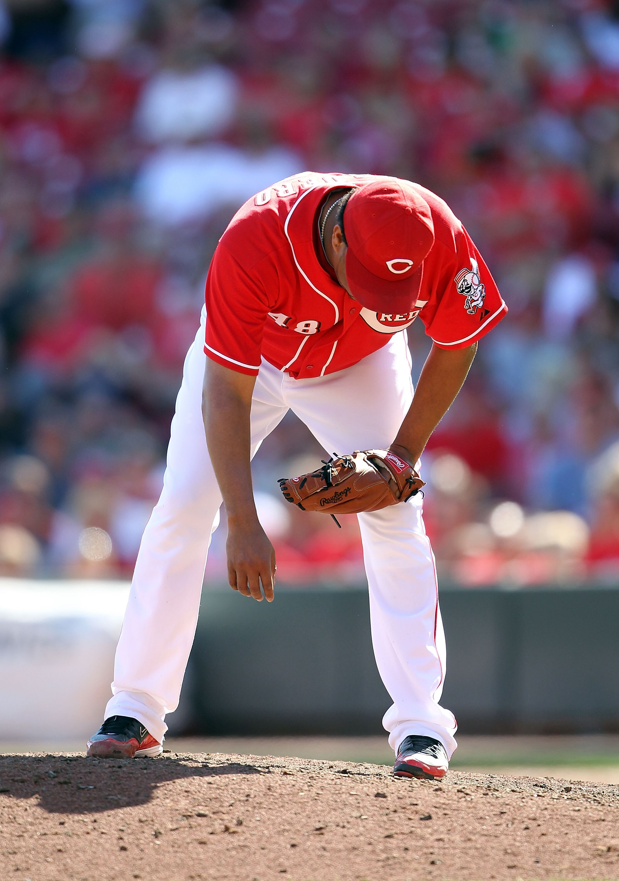 CINCINNATI - SEPTEMBER 12:  Francisco Cordero #48 of the Cincinnati Reds is bent over during the ninth inning in which he allowed 3 runs during the game against the Pittsburgh Pirates at Great American Ballpark on September 12, 2010 in Cincinnati, Ohio.Pi