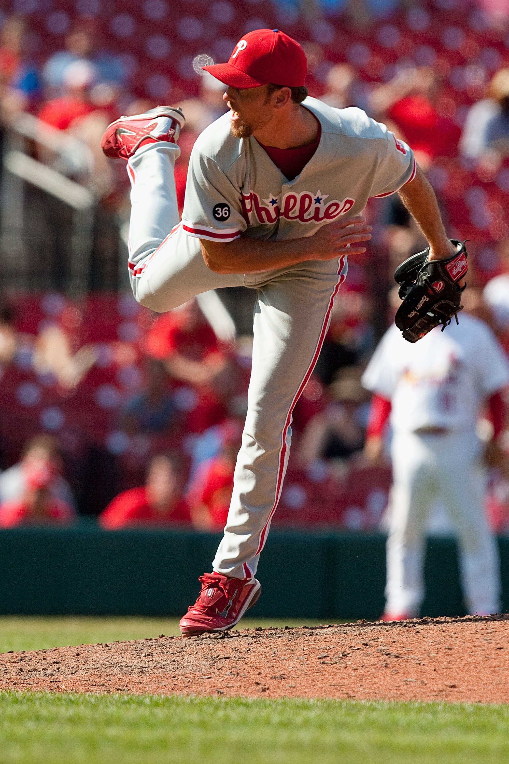 ST. LOUIS - JULY 22: Relief pitcher Brad Lidge #54 of the Philadelphia Phillies throws against the St. Louis Cardinals at Busch Stadium on July 22, 2010 in St. Louis, Missouri. The Phillies defeated the Cardinals 2-0.  (Photo by Dilip Vishwanat/Getty Imag