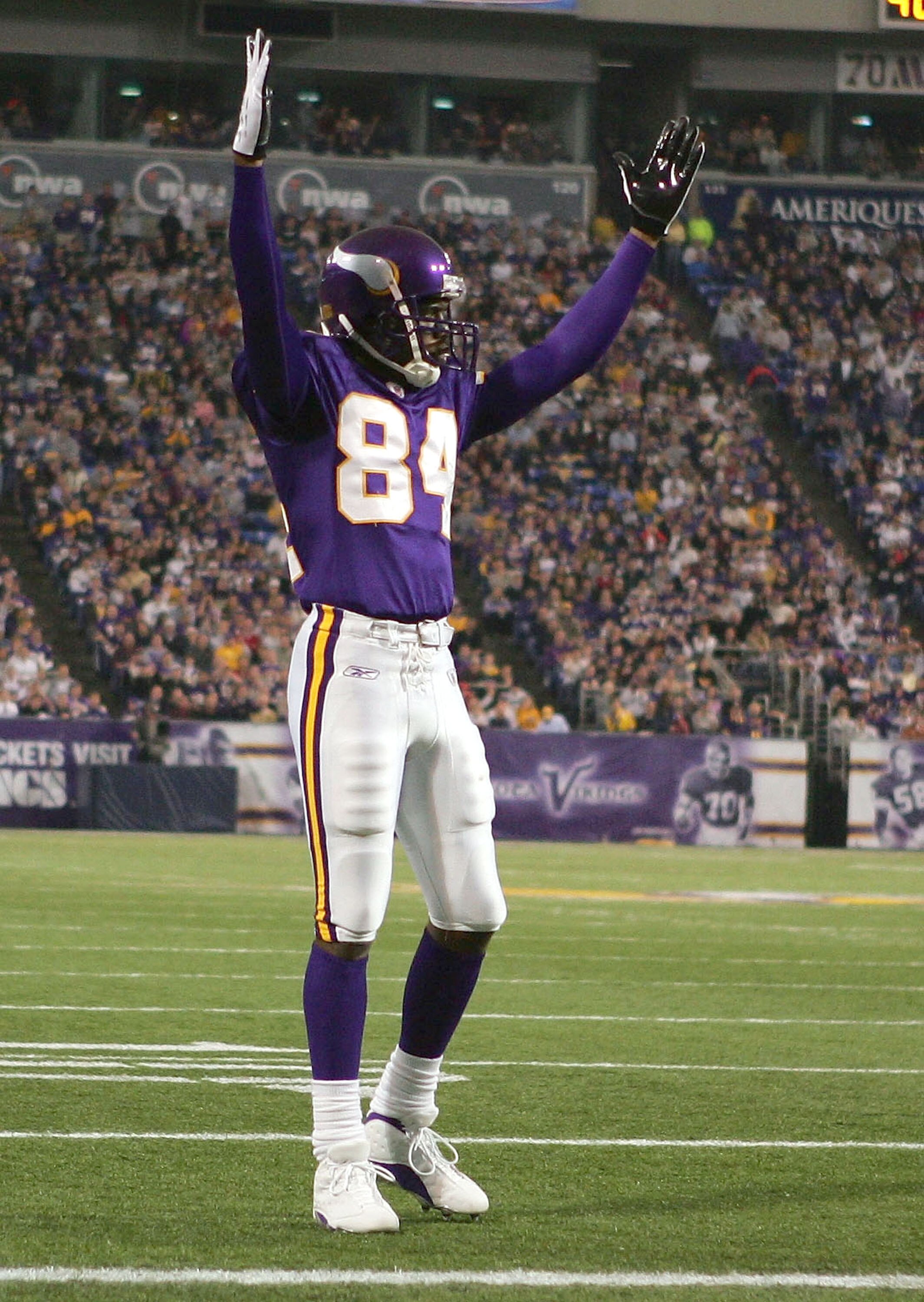MINNEAPOLIS - NOVEMBER 28:  Randy Moss #84 of the Minnesota Vikings celebrates a touchdown in the first half against the Jacksonville Jaguars on November 28, 2004 at the Hubert H. Humphrey Metrodome in Minneapolis, Minnesota. The Minnesota Vikings defeate