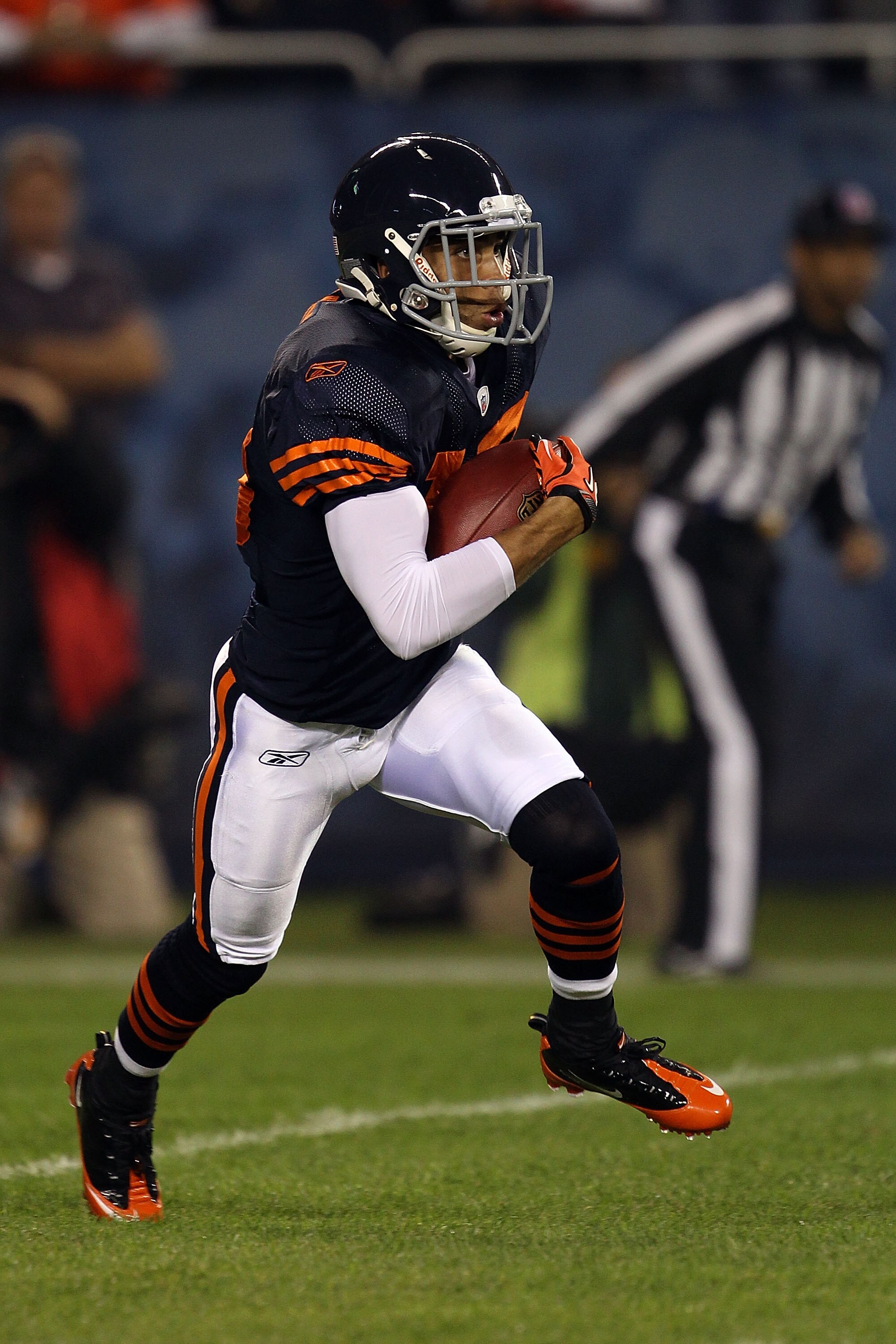 CHICAGO - SEPTEMBER 27:  Johnny Knox #13 of the Chicago Bears returns a kickoff against the Green Bay Packers at Soldier Field on September 27, 2010 in Chicago, Illinois. The Bears won 20-17.  (Photo by Jonathan Daniel/Getty Images)
