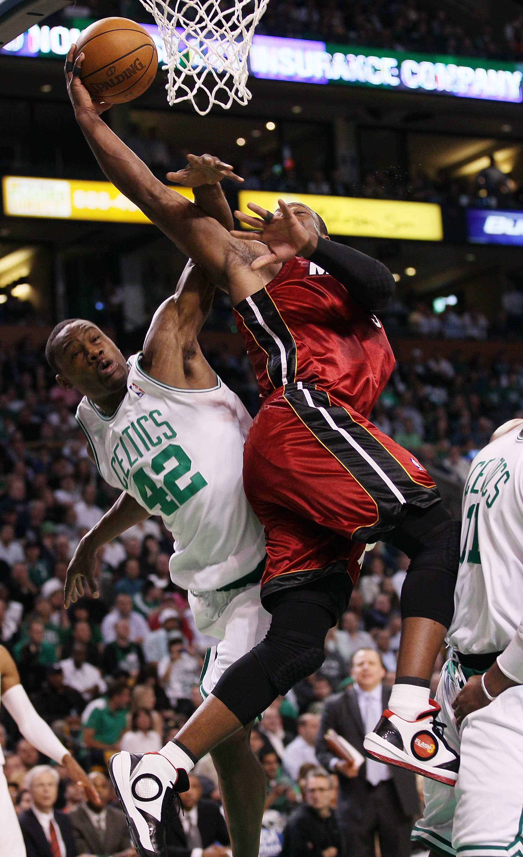BOSTON - APRIL 20: Tony Allen #42 of the Boston Celtics fouls Dwyane Wade #3 of the Miami Heat during Game Two of the Eastern Conference Quarterfinals of the 2010 NBA playoffs at the TD Garden on April 20, 2010 in Boston, Massachusetts. The Celtics def BOSTON - APRIL 20: Tony Allen #42 of the Boston Celtics fouls Dwyane Wade #3 of the Miami Heat during Game Two of the Eastern Conference Quarterfinals of the 2010 NBA playoffs at the TD Garden on April 20, 2010 in Boston, Massachusetts. The Celtics def