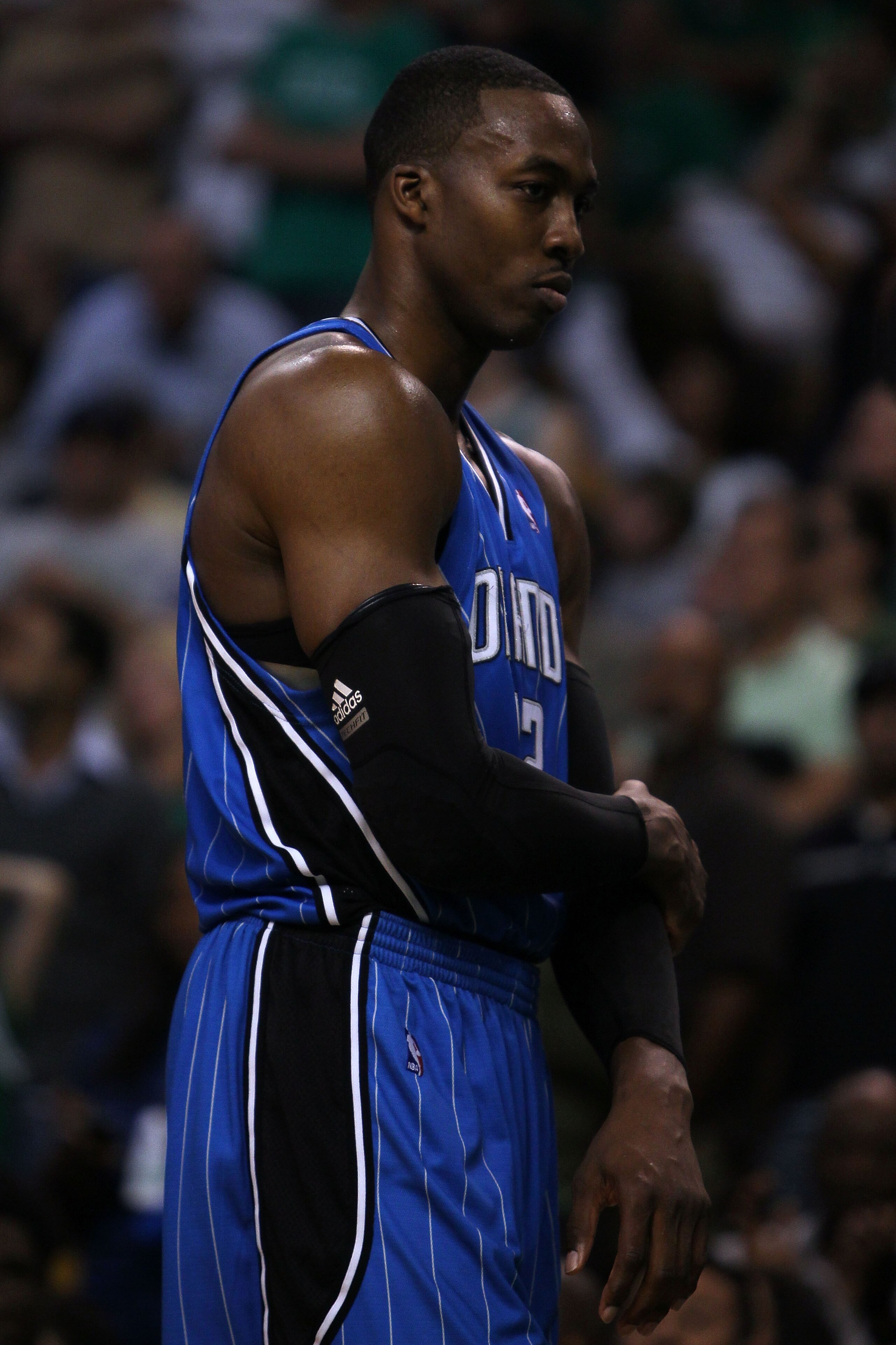 BOSTON - MAY 28:  Dwight Howard #12 of the Orlando Magic hangs his head as he stands on court against the Boston Celtics in Game Six of the Eastern Conference Finals during the 2010 NBA Playoffs at TD Garden on May 28, 2010 in Boston, Massachusetts.  NOTE