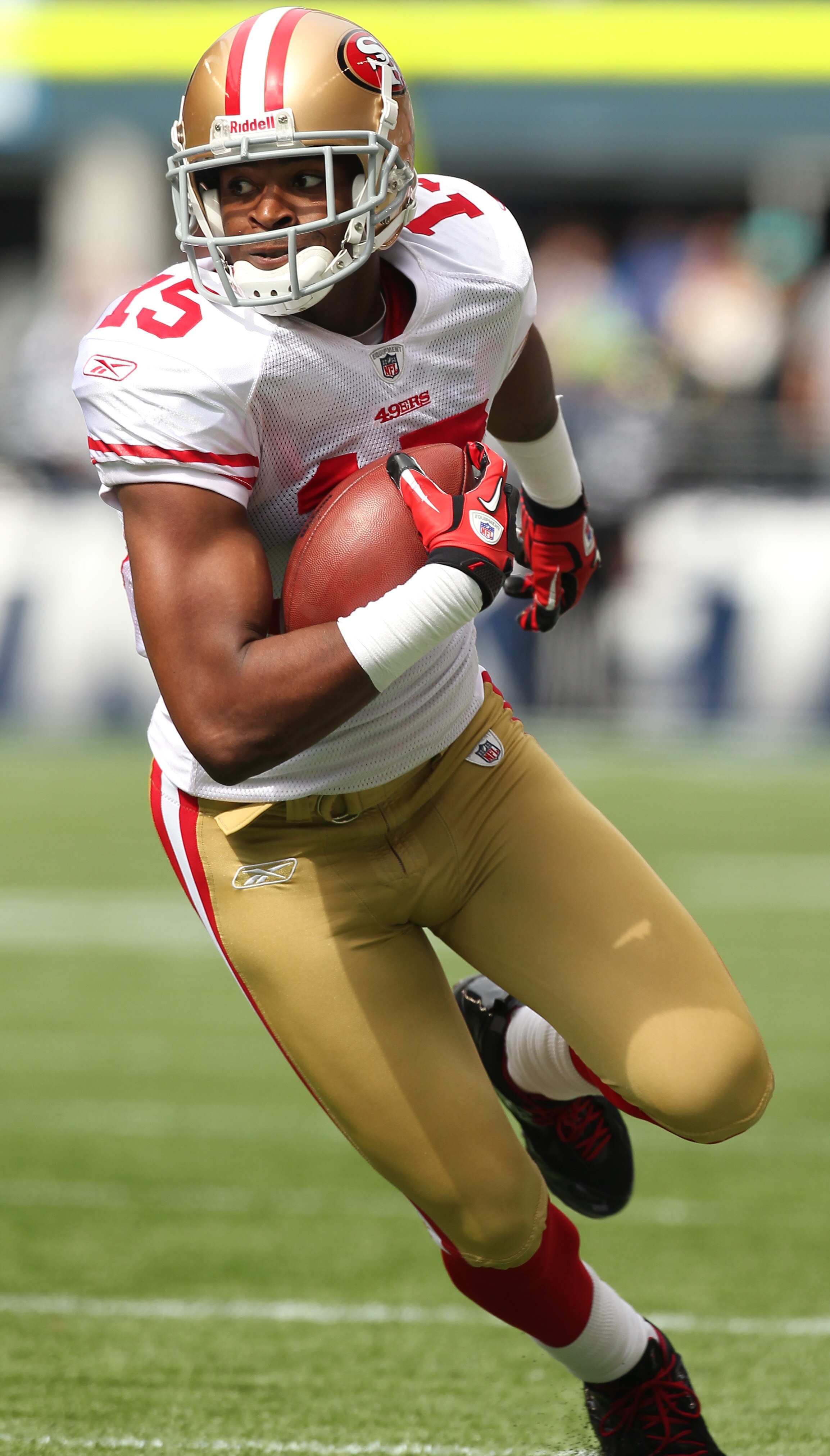 SEATTLE - SEPTEMBER 12:  Wide receiver Michael Crabtree #15 of the San Francisco 49ers rushes during the NFL season opener against the Seattle Seahawks at Qwest Field on September 12, 2010 in Seattle, Washington. (Photo by Otto Greule Jr/Getty Images)