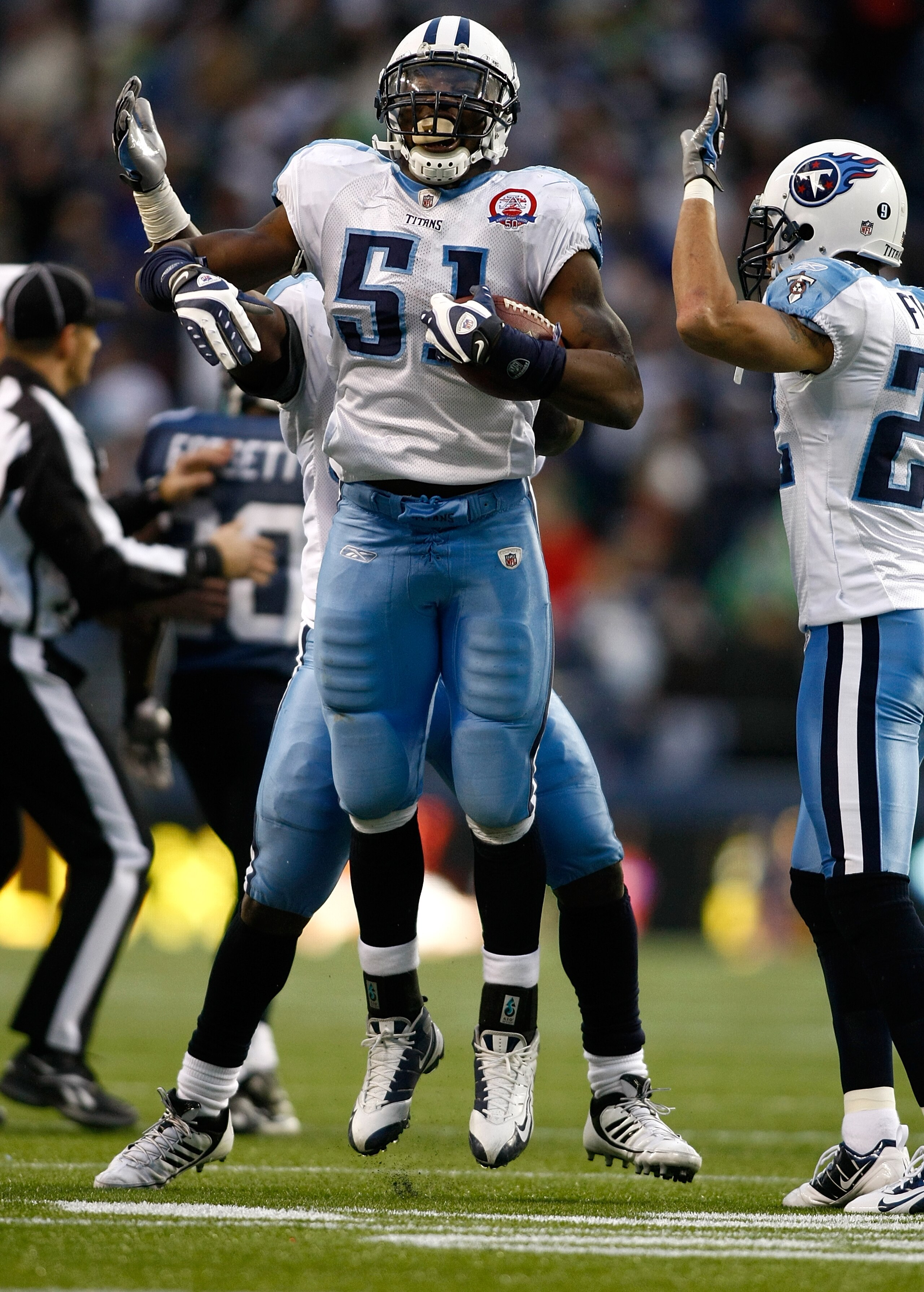 SEATTLE , WA - JANUARY 03: Gerald McRath #51 of the Tennessee Titans celebrates an interception that sealed a 17-13 victory over the Seattle Seahawks  at Qwest Field on January 3, 2010 in Seattle, Washington.  (Photo by Jonathan Ferrey/Getty Images)