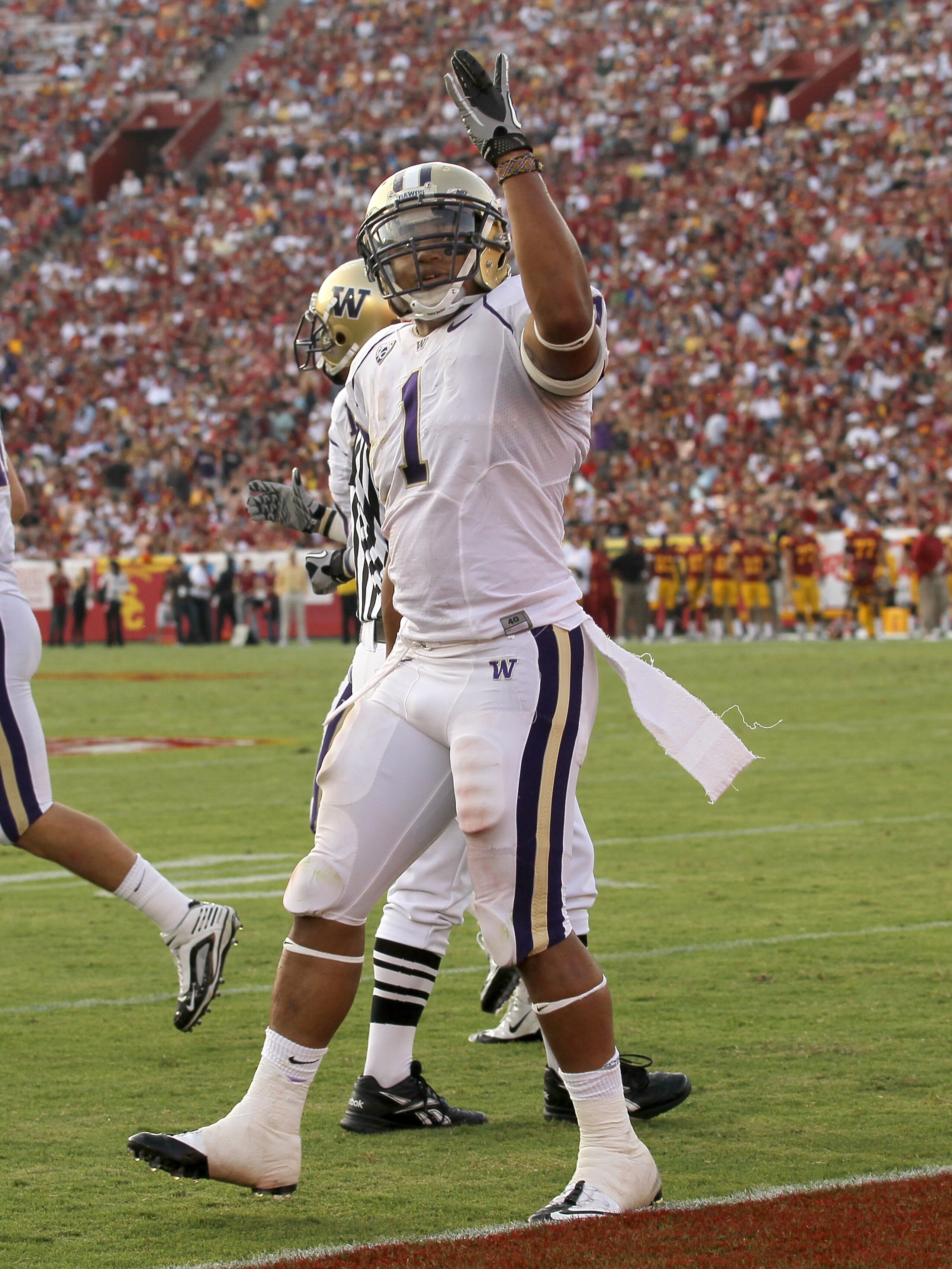 LOS ANGELES, CA - OCTOBER 02: Running back Chris Polk #1 of the Washington Huskies celebrates his second quarter touchdown against the USC Trojans at the Los Angeles Memorial Coliseum on October 2, 2010 in Los Angeles, California. Washington won 32-31. LOS ANGELES, CA - OCTOBER 02: Running back Chris Polk #1 of the Washington Huskies celebrates his second quarter touchdown against the USC Trojans at the Los Angeles Memorial Coliseum on October 2, 2010 in Los Angeles, California. Washington won 32-31.