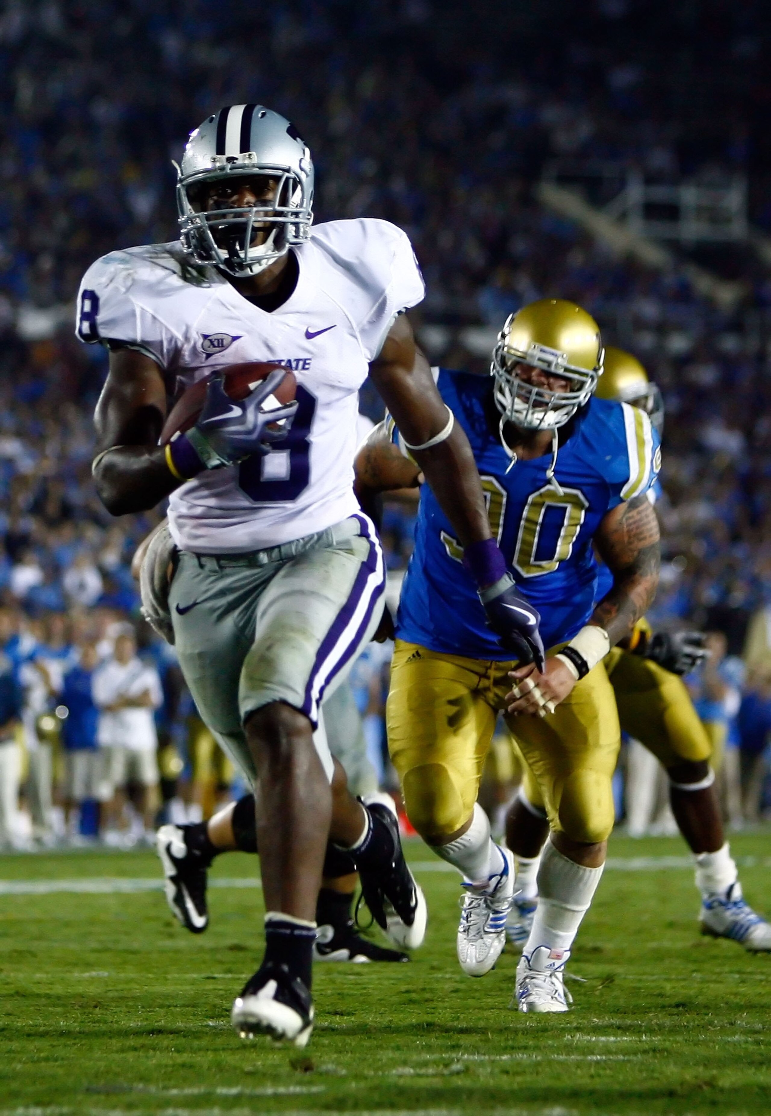PASADENA, CA - SEPTEMBER 19: Runningback Daniel Thomas #8 of the Kansas State Wildcats carries the ball against the UCLA Bruins at the Rose Bowl on September 19, 2009 in Pasadena, California. UCLA defeated Kansas State 23-9. (Photo by Jeff Gross/Getty I PASADENA, CA - SEPTEMBER 19: Runningback Daniel Thomas #8 of the Kansas State Wildcats carries the ball against the UCLA Bruins at the Rose Bowl on September 19, 2009 in Pasadena, California. UCLA defeated Kansas State 23-9. (Photo by Jeff Gross/Getty I
