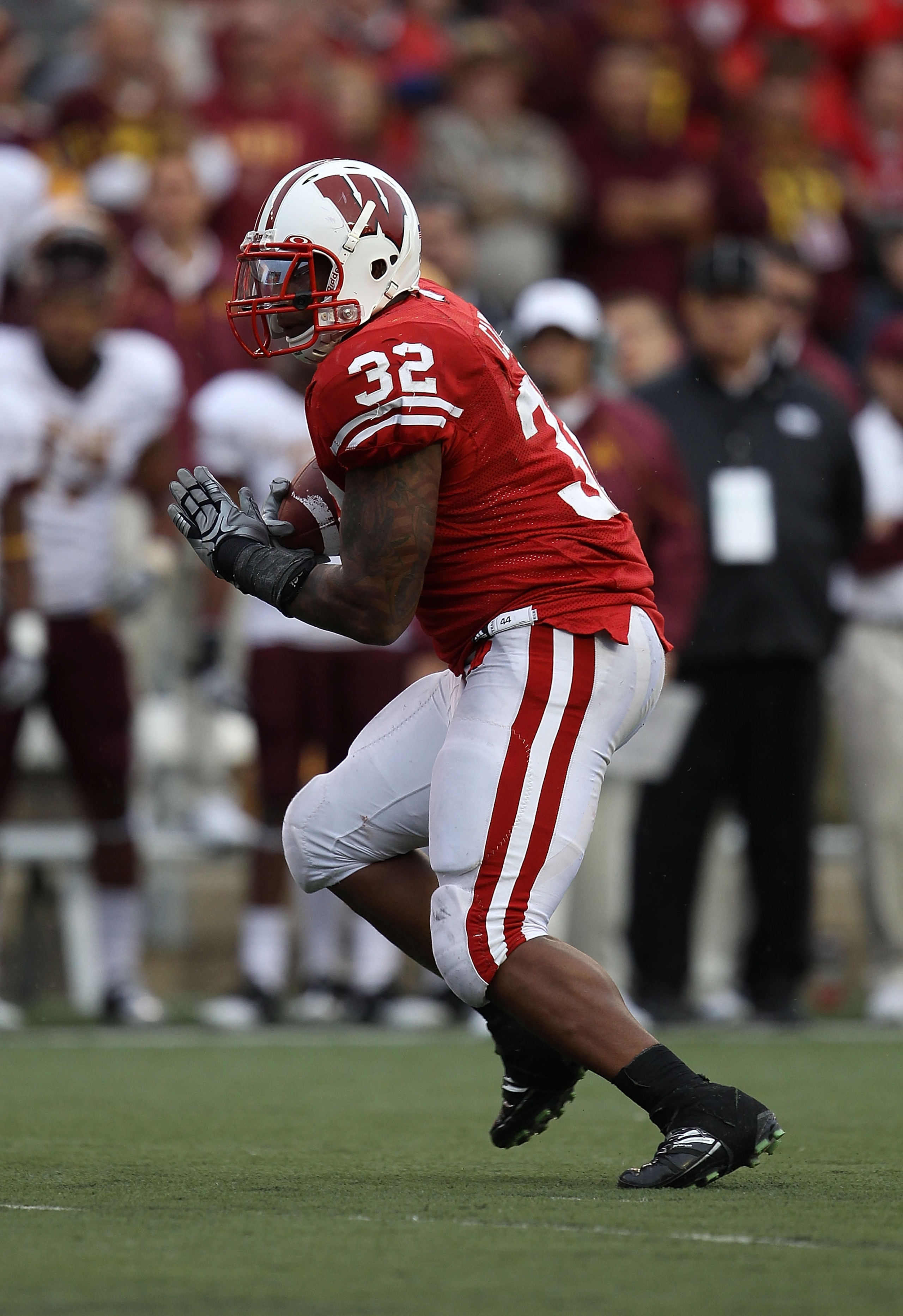 MADISON, WI - SEPTEMBER 18: John Clay #32 of the Wisconsin Badgers runs against the Arizona State Sun Devils at Camp Randall Stadium on September 18, 2010 in Madison, Wisconsin. Wisconsin defeated Arizona State 20-19. (Photo by Jonathan Daniel/Getty Image MADISON, WI - SEPTEMBER 18: John Clay #32 of the Wisconsin Badgers runs against the Arizona State Sun Devils at Camp Randall Stadium on September 18, 2010 in Madison, Wisconsin. Wisconsin defeated Arizona State 20-19. (Photo by Jonathan Daniel/Getty Image