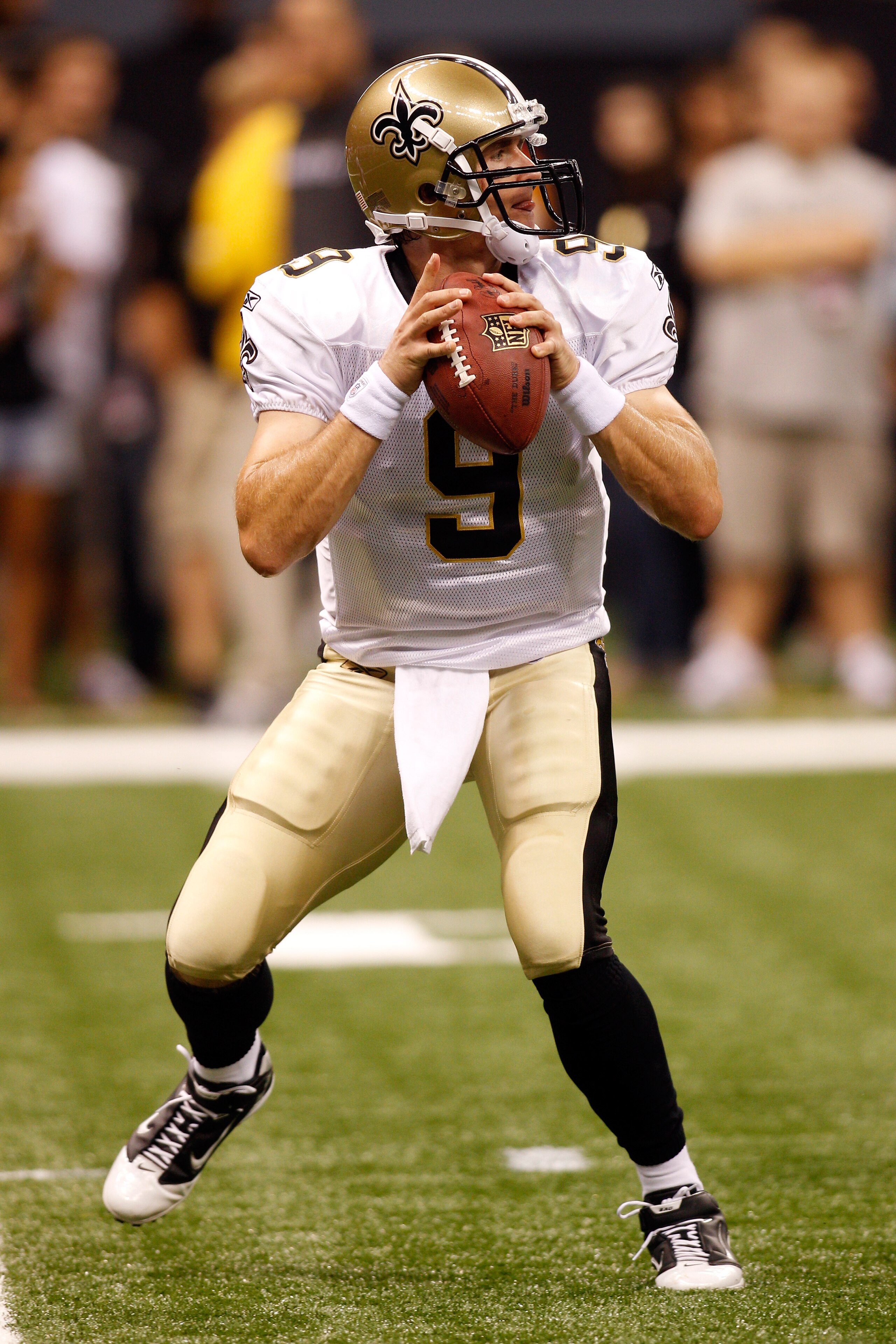 NEW ORLEANS - AUGUST 21:  Drew Brees #9 of the New Orleans Saints warms up during pregame before playing  the Houston Texans at the Louisiana Superdome on August 21, 2010 in New Orleans, Louisiana.  (Photo by Chris Graythen/Getty Images)