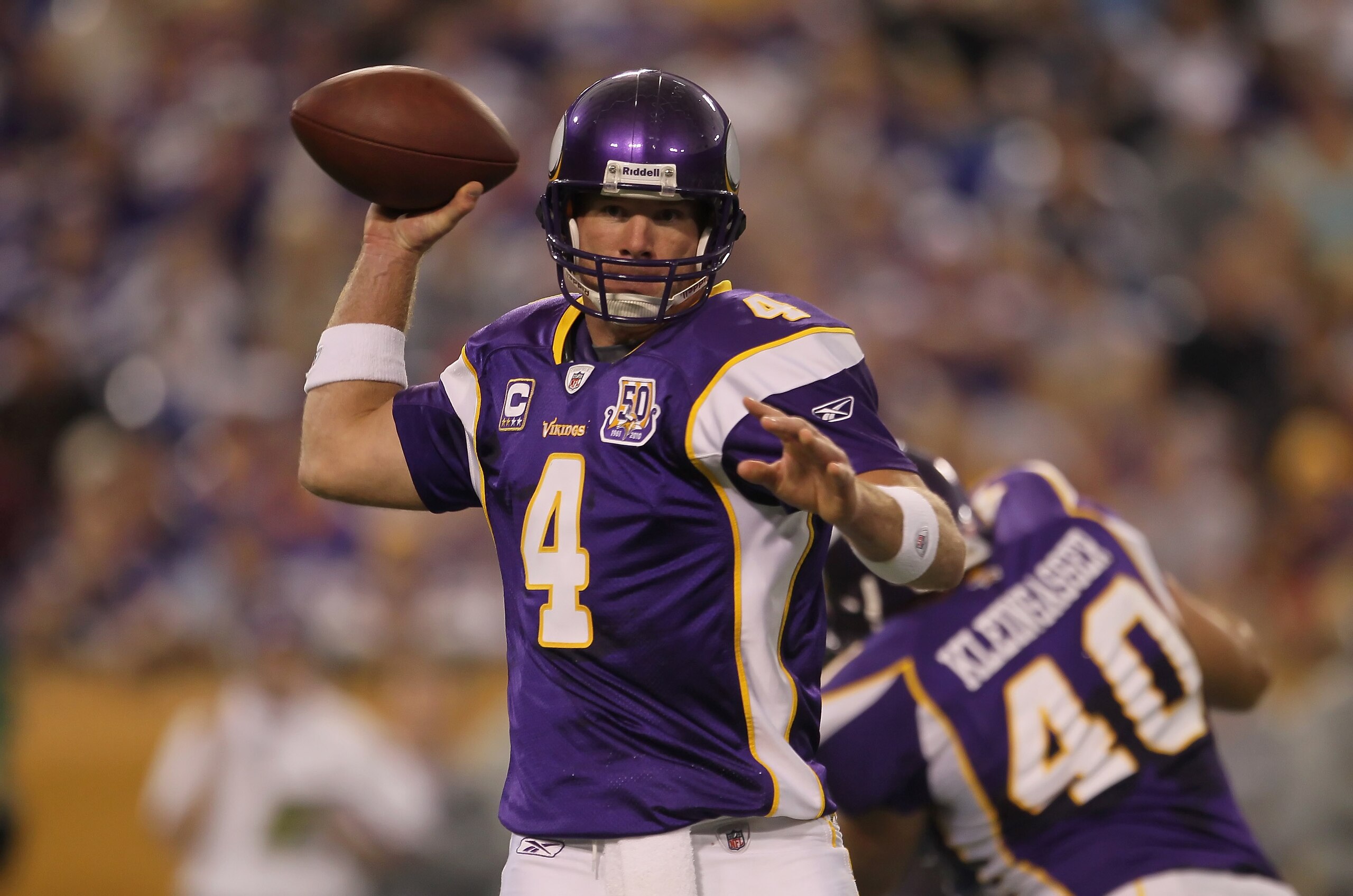 MINNEAPOLIS - SEPTEMBER 26:  Quarterback Brett Favre #4 of the Minnesota Vikings drops back to pass against the Detroit Lions during the first half at Hubert H. Humphrey Metrodome on September 26, 2010 in Minneapolis, Minnesota.  (Photo by Jeff Gross/Gett