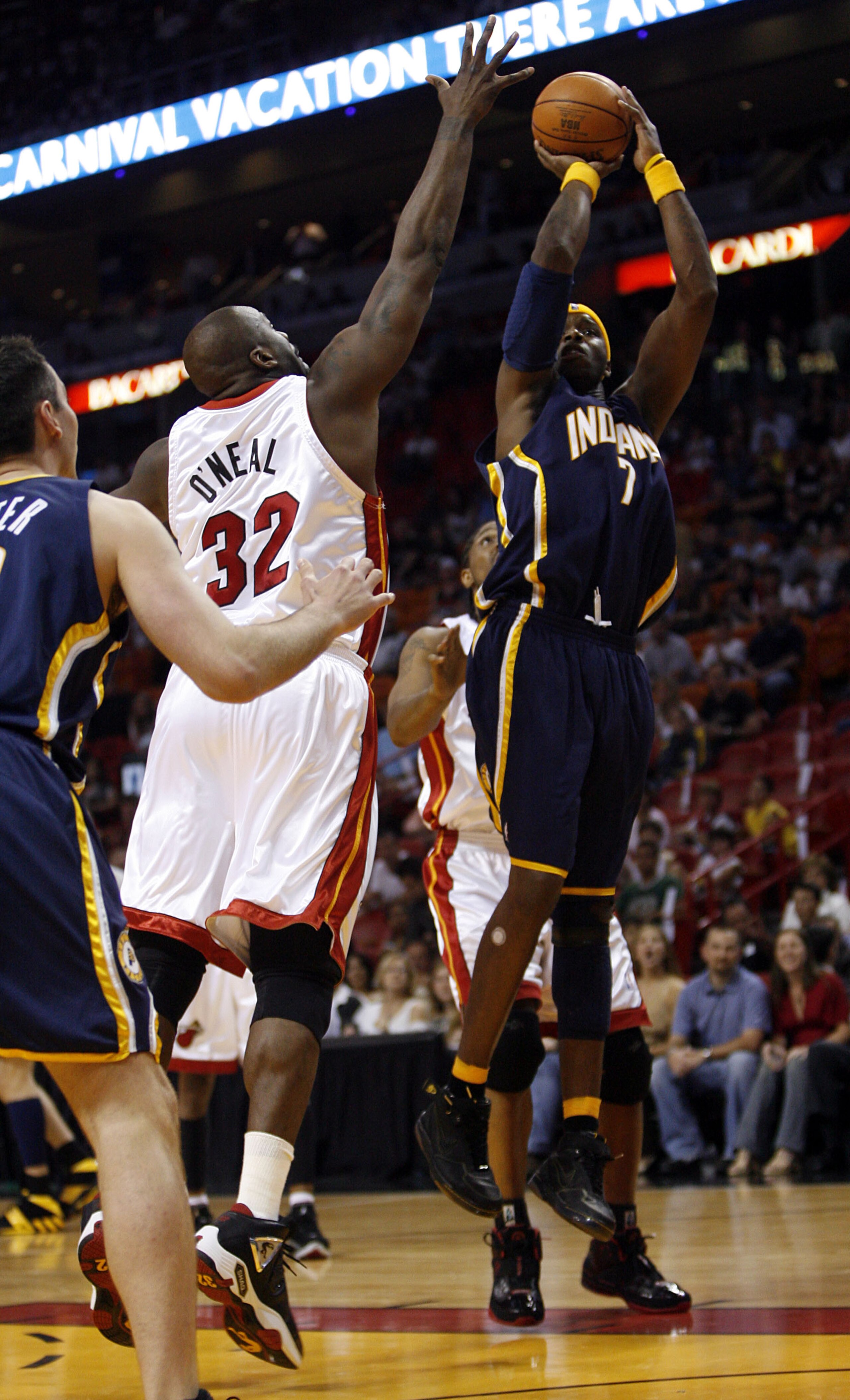 MIAMI - APRIL 13: Jermaine O'Neal #7 of the Indiana Pacers shoots over Shaquille O'Neal #32 of the Miami Heat on April 13, 2007 at the American Airlines Arena in Miami  Florida. NOTE TO USER: User expressly acknowledges and agrees that, by downloading and