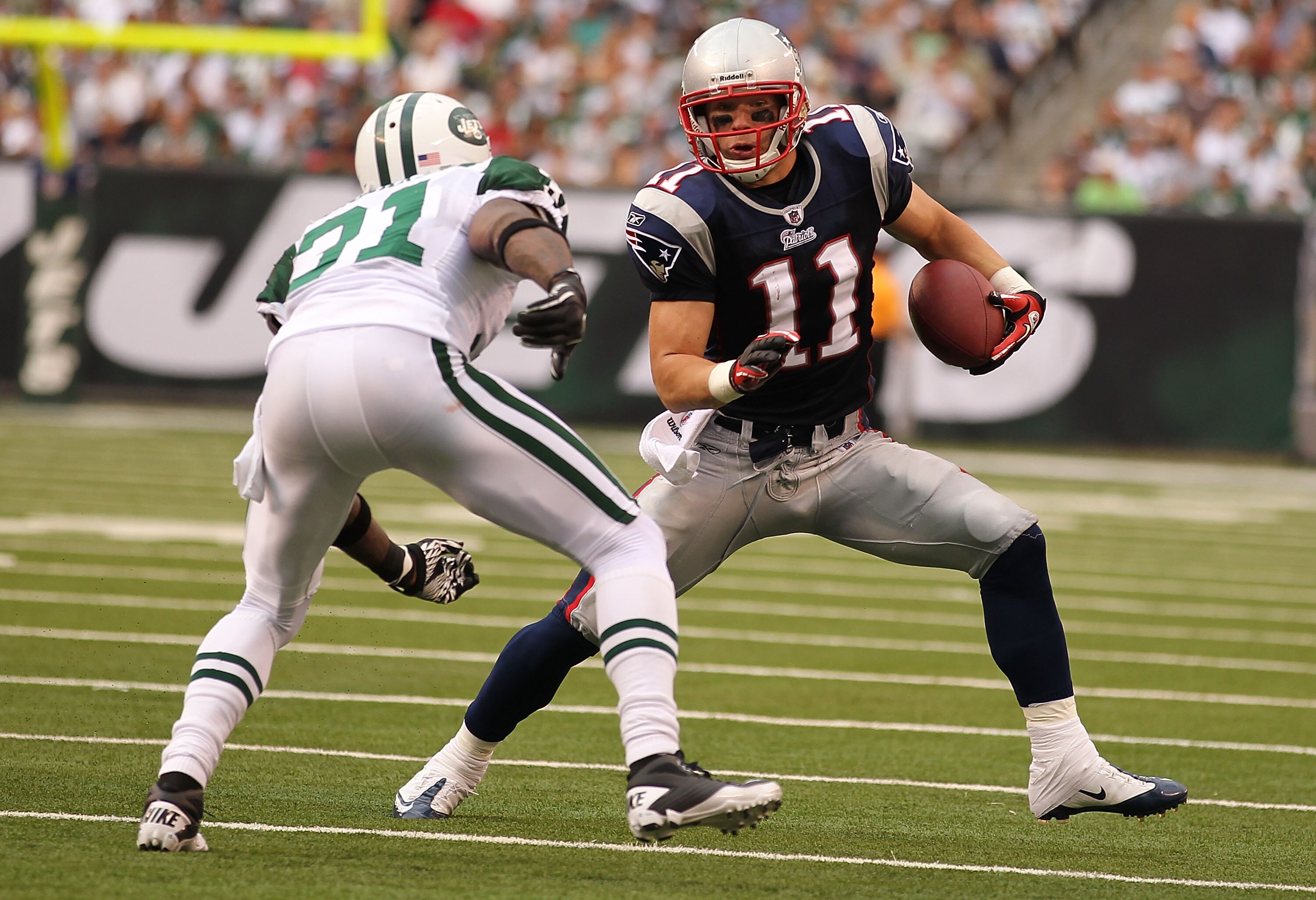 EAST RUTHERFORD, NJ - SEPTEMBER 19:  Antonio Cromartie #31 of the New York Jets tackles Julian Edelman #11 of the New England Patriots during their  game on September 19, 2010 at the New Meadowlands Stadium  in East Rutherford, New Jersey.  (Photo by Al B