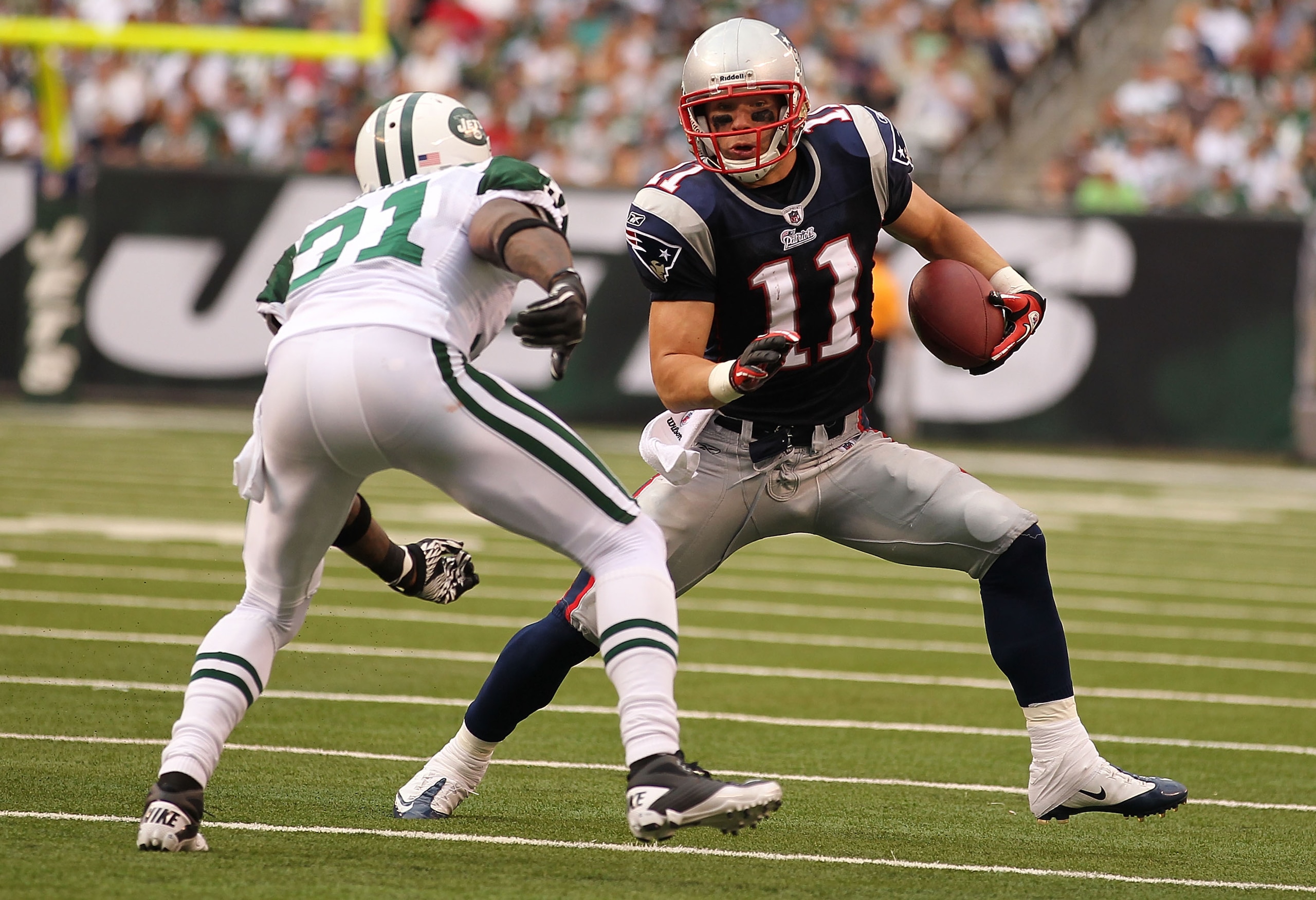 EAST RUTHERFORD, NJ - SEPTEMBER 19:  Antonio Cromartie #31 of the New York Jets tackles Julian Edelman #11 of the New England Patriots during their  game on September 19, 2010 at the New Meadowlands Stadium  in East Rutherford, New Jersey.  (Photo by Al B