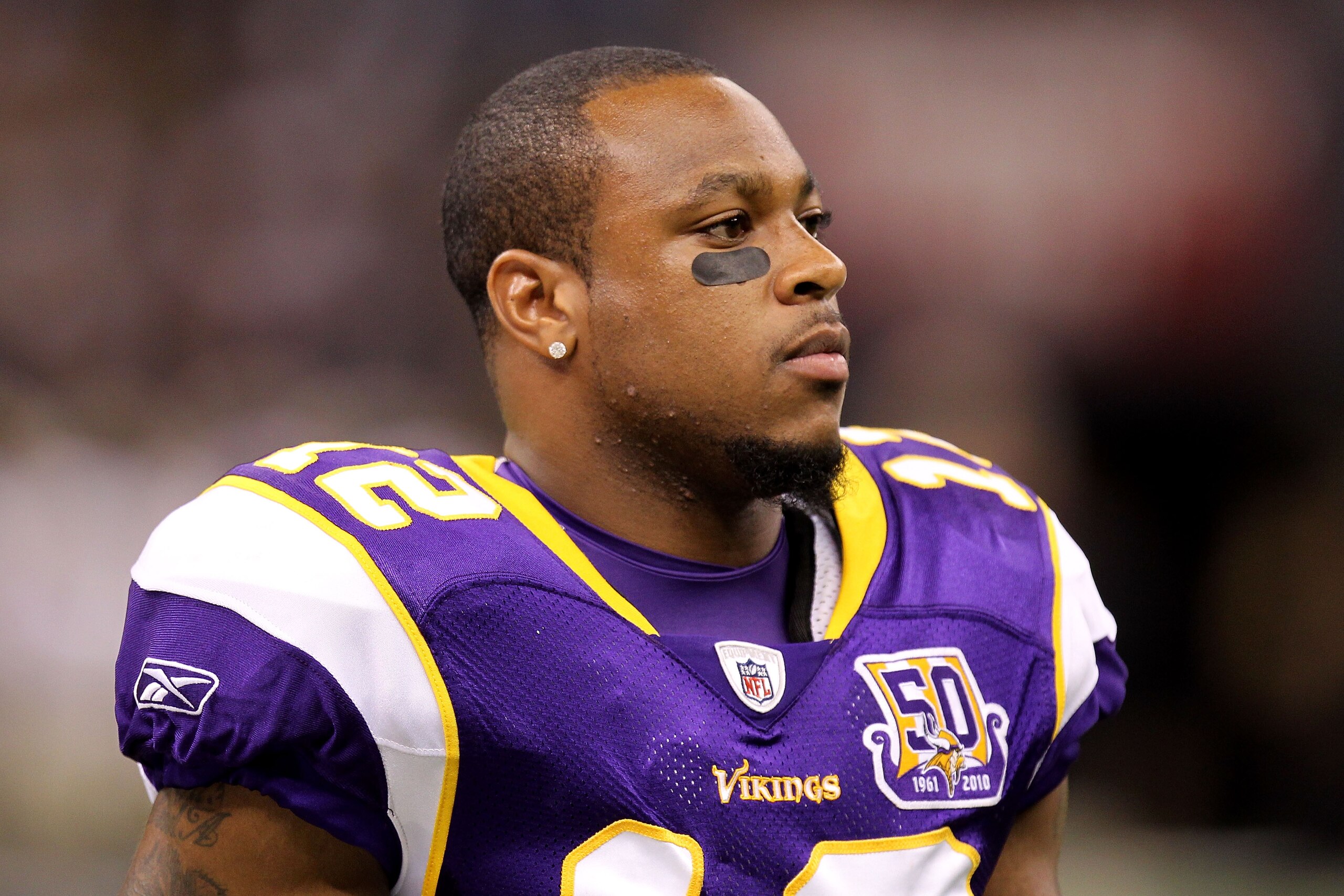 NEW ORLEANS - SEPTEMBER 09:  Percy Harvin #12 of  the Minnesota Vikings looks on against the New Orleans Saints at Louisiana Superdome on September 9, 2010 in New Orleans, Louisiana.  (Photo by Ronald Martinez/Getty Images)