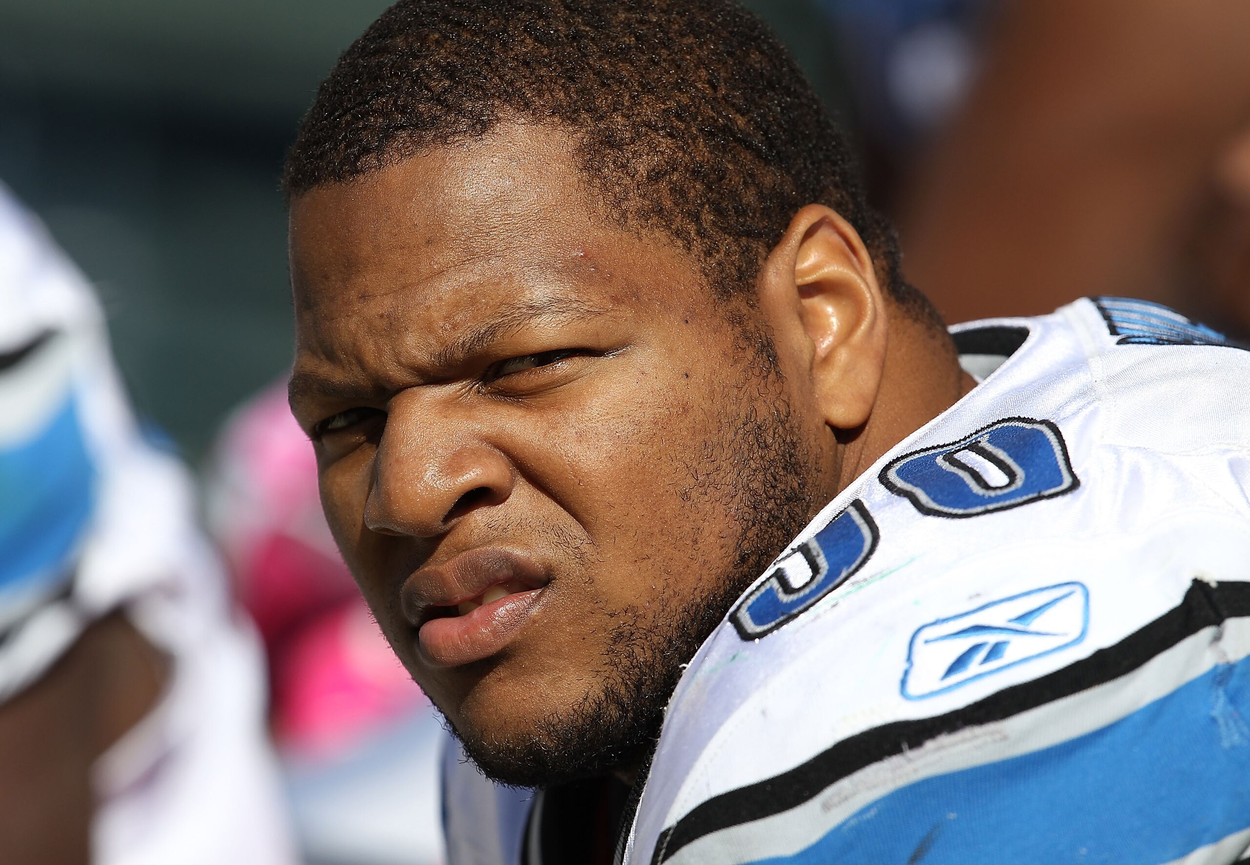 GREEN BAY, WI - OCTOBER 03: Ndamukong Suh #90 of the Detroit Lions rests on the bench during a game against the Green Bay Packers at Lambeau Field on October 3, 2010 in Green Bay, Wisconsin. The Packers defeated the Lions 28-26. (Photo by Jonathan Daniel/