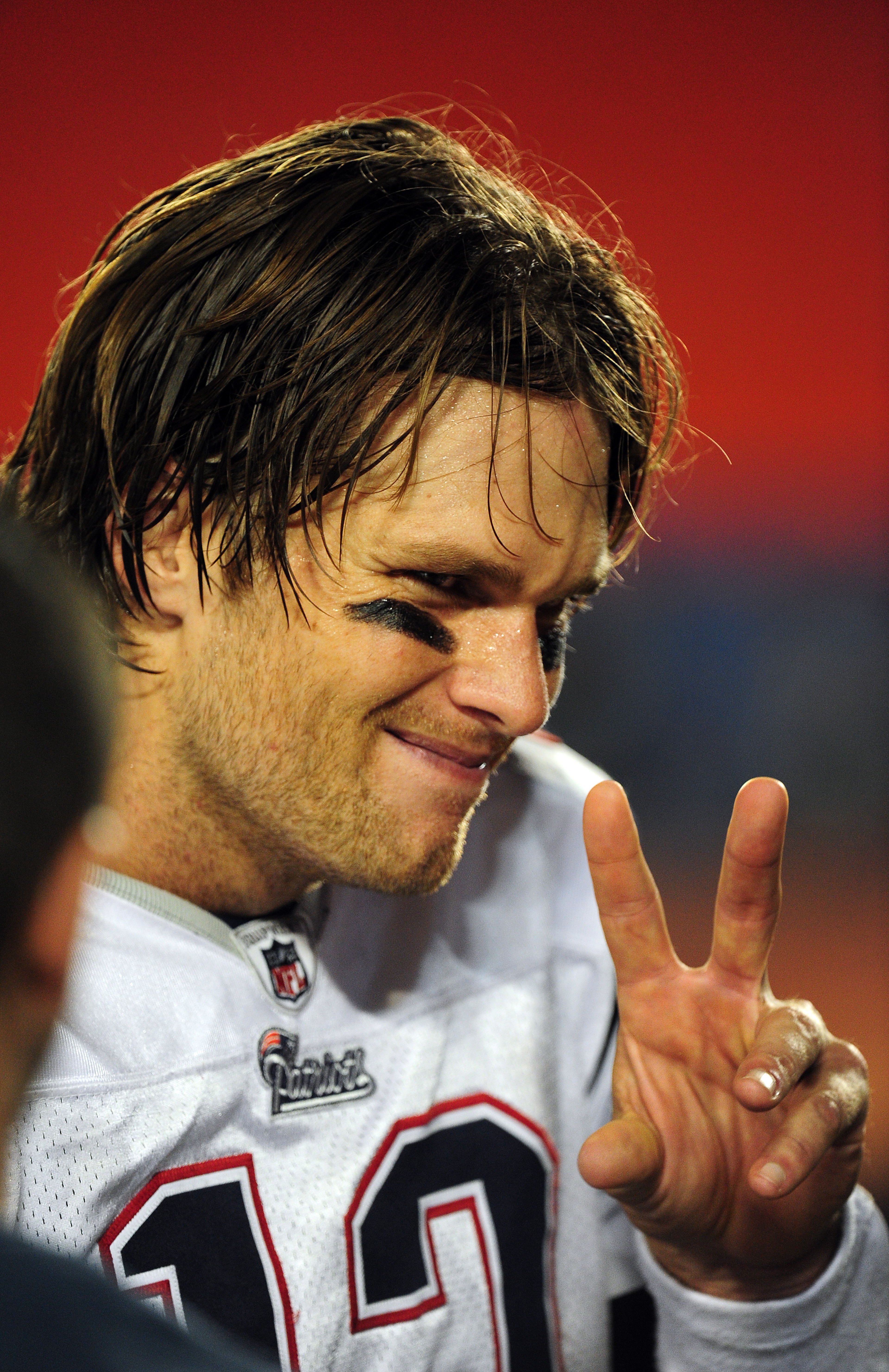 MIAMI - OCTOBER 4: Tom Brady #12 of the New England Patriots celebrates after the game against the Miami Dolphins at Sun Life Field on October 4, 2010 in Miami, Florida. (Photo by Scott Cunningham/Getty Images)