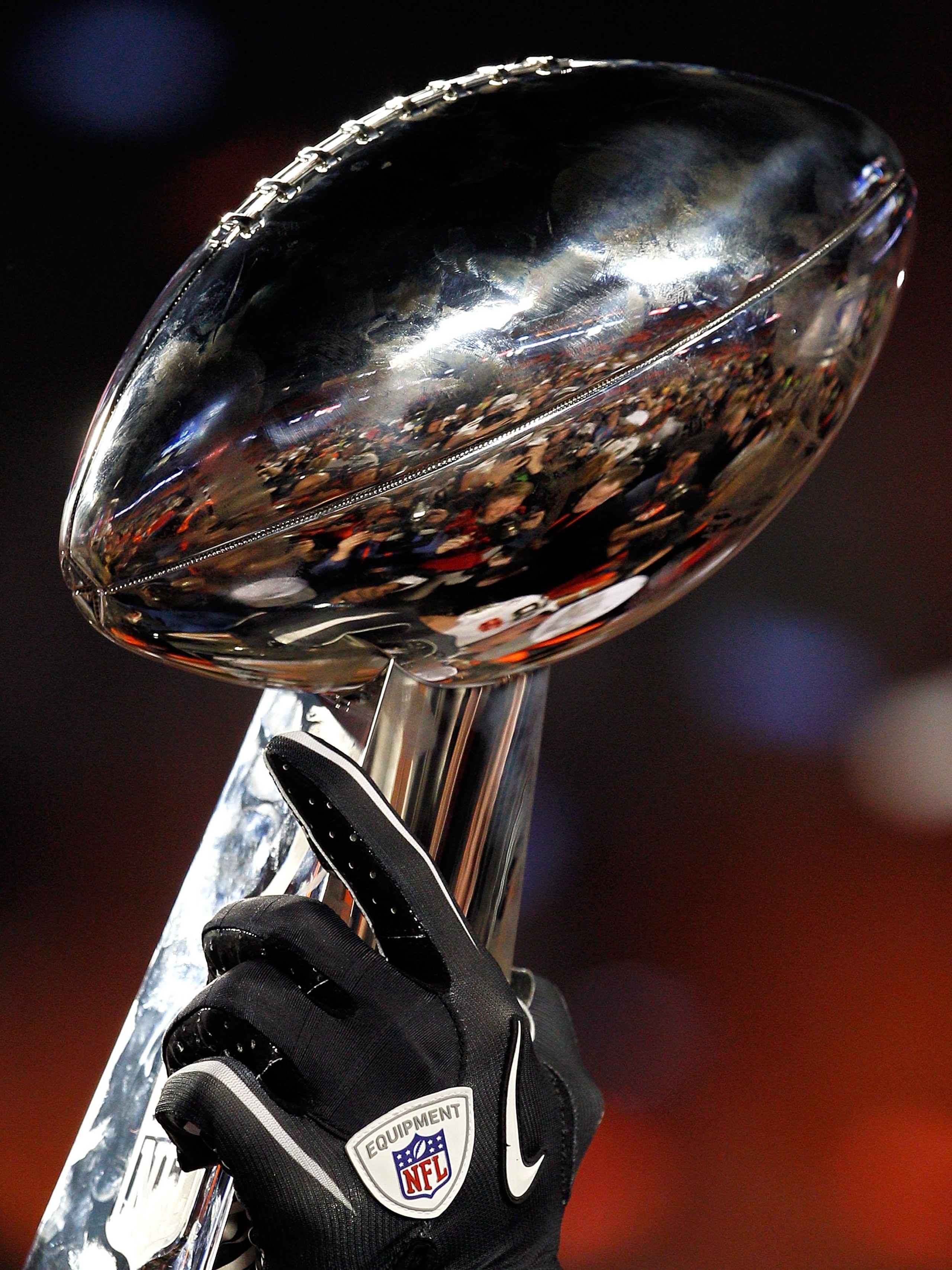 MIAMI GARDENS, FL - FEBRUARY 07:  A detail of the Vince Lombardi Trophy as the New Orleans Saints celebrate after defeating the Indianapolis Colts during Super Bowl XLIV on February 7, 2010 at Sun Life Stadium in Miami Gardens, Florida.  (Photo by Jonatha
