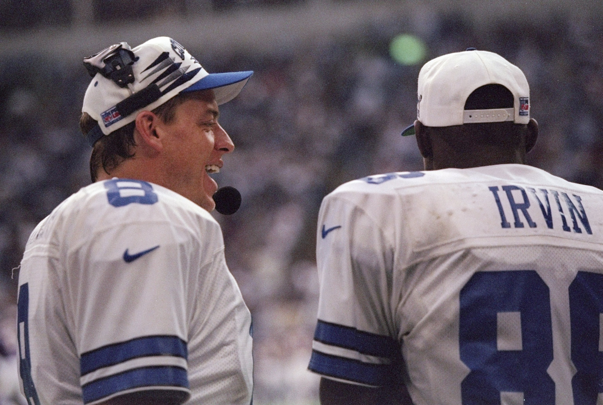28 Dec 1996:  Quarterback Troy Aikman (left) and wide receiver Michael Irvin of the Dallas Cowboys confer during a playoff game against the Minnesota Vikings at Texas Stadium in Irving, Texas.  The Cowboys won the game, 40-15. Mandatory Credit: Brian Bahr
