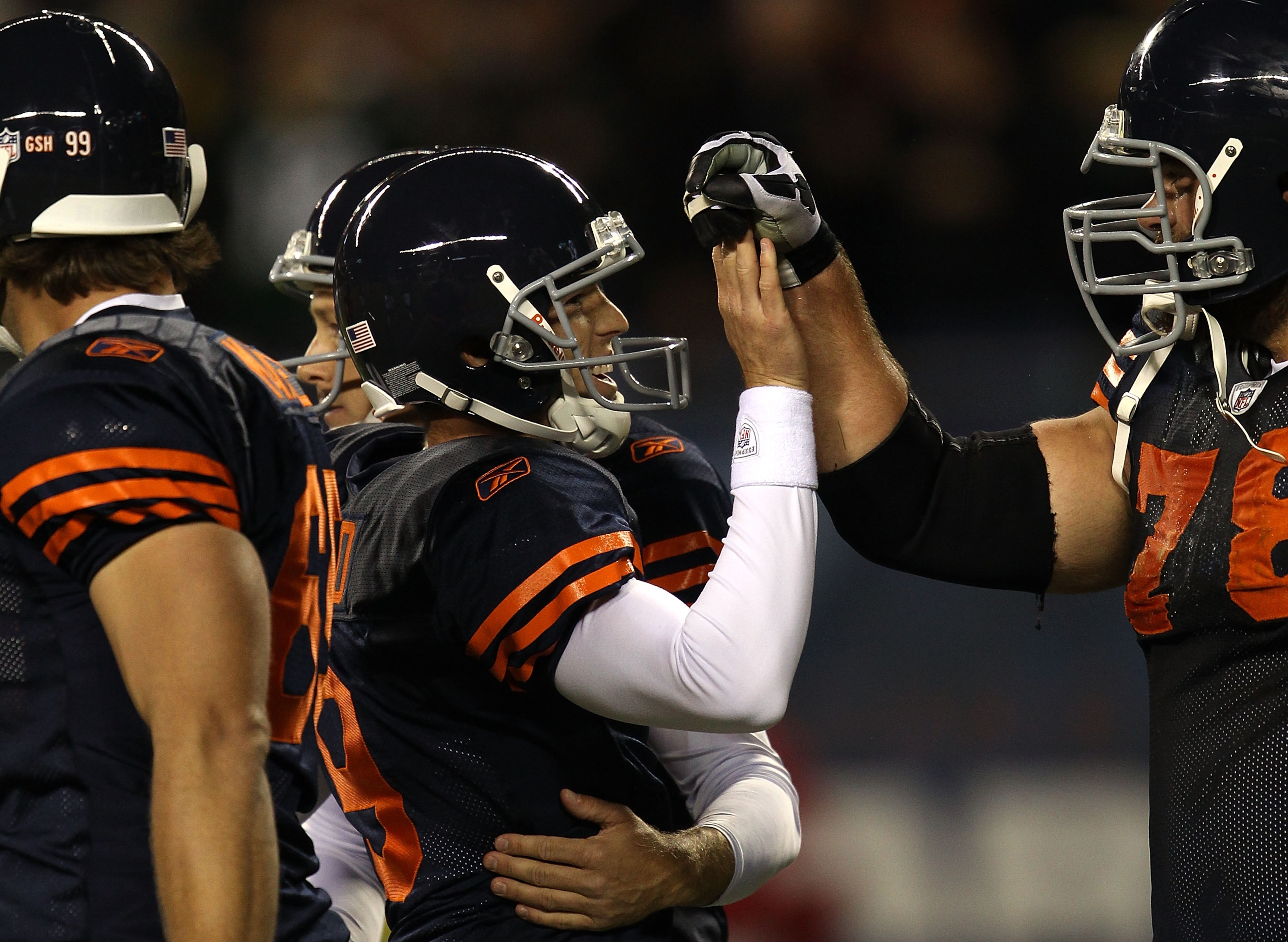 CHICAGO - SEPTEMBER 27:  Robbie Gould #9 of the Chicago Bears celebrates with Kevin Shaffer #78 after Gould kicked a successful 19-yard field goal with 4 seconds left in the fourth quarter to give the Bears a 20-17 win against the Green Bay Packers at Sol