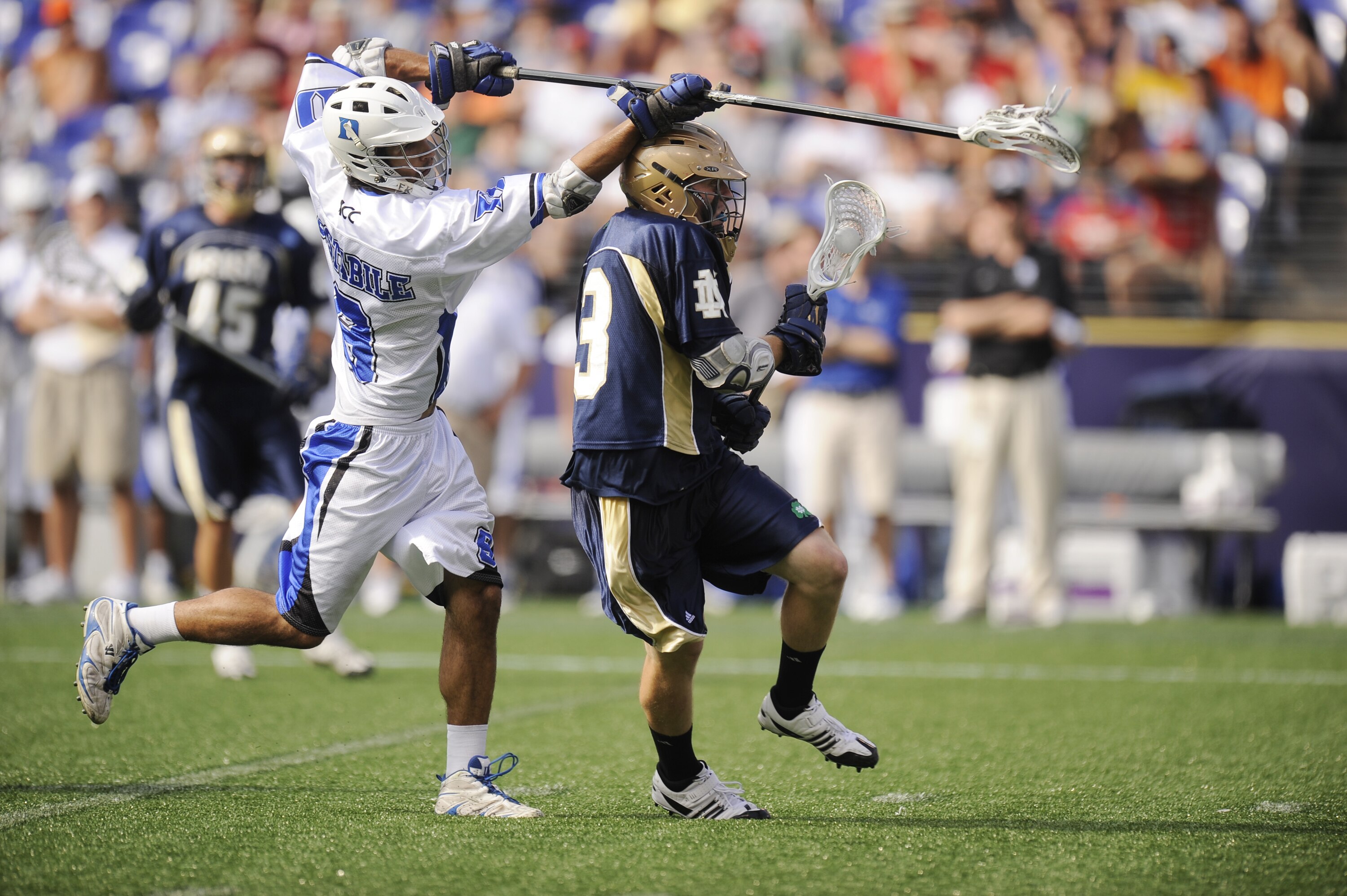 BALTIMORE, MD - MAY 31:  Kelly McKenna #13 of the Notre Dame Fighting Irish tries to get by CJ Costabile #9 of the Duke Blue Devils during the 2010 NCAA Division 1 Lacrosse Championship game on May 31, 2010 at M&T Bank Stadium in Baltimore, Maryland.  (Ph