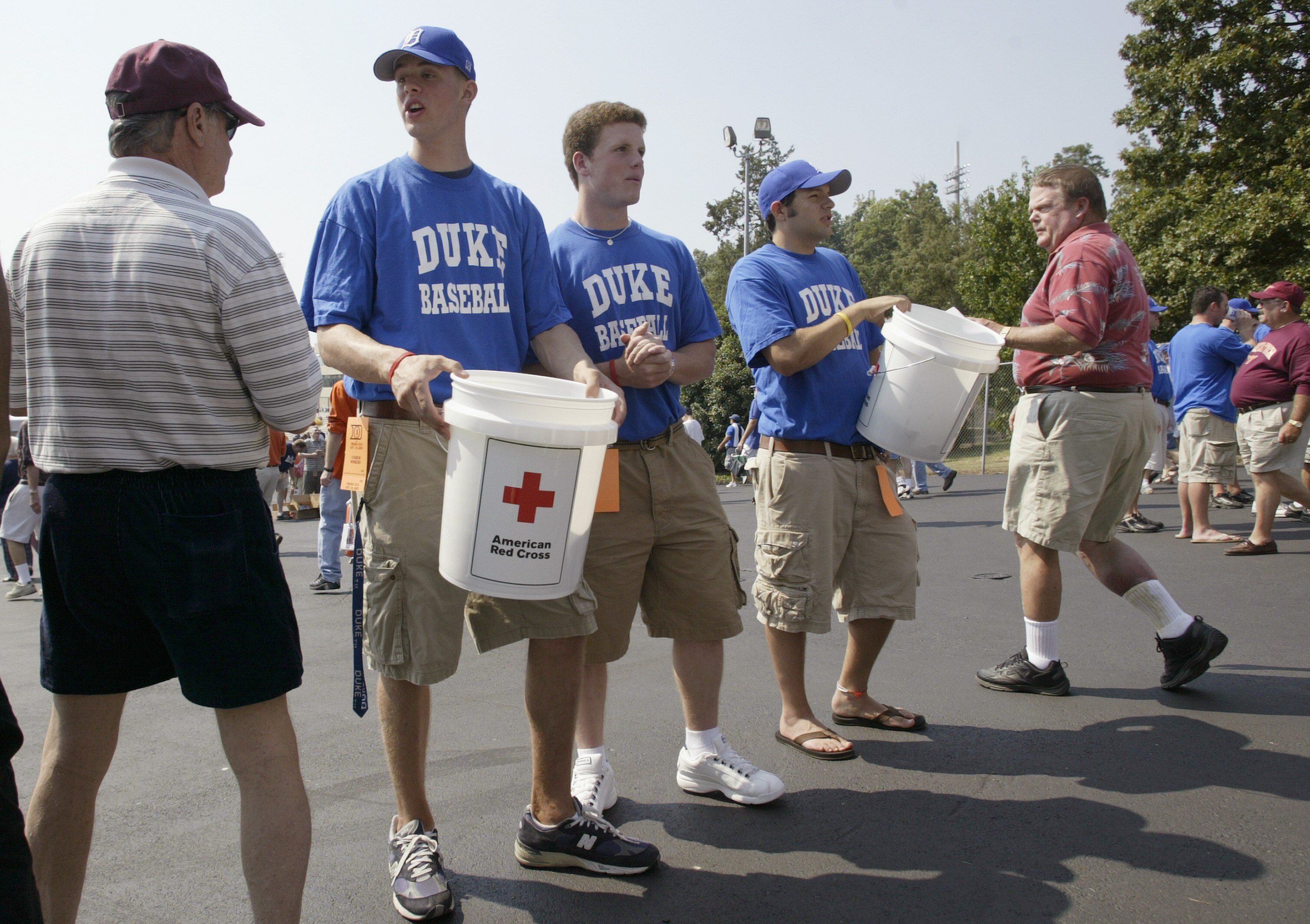 DURHAM, NC - SEPTEMBER 10:  The Duke Blue Devil Baseball Team collects money from Virginia Tech Hokie fans for the Red Cross Hurricane Katrina relief effort at Wallace Wade Stadium on September 10, 2005 in Durham, North Carolina. (Photo by Craig Jones/Get