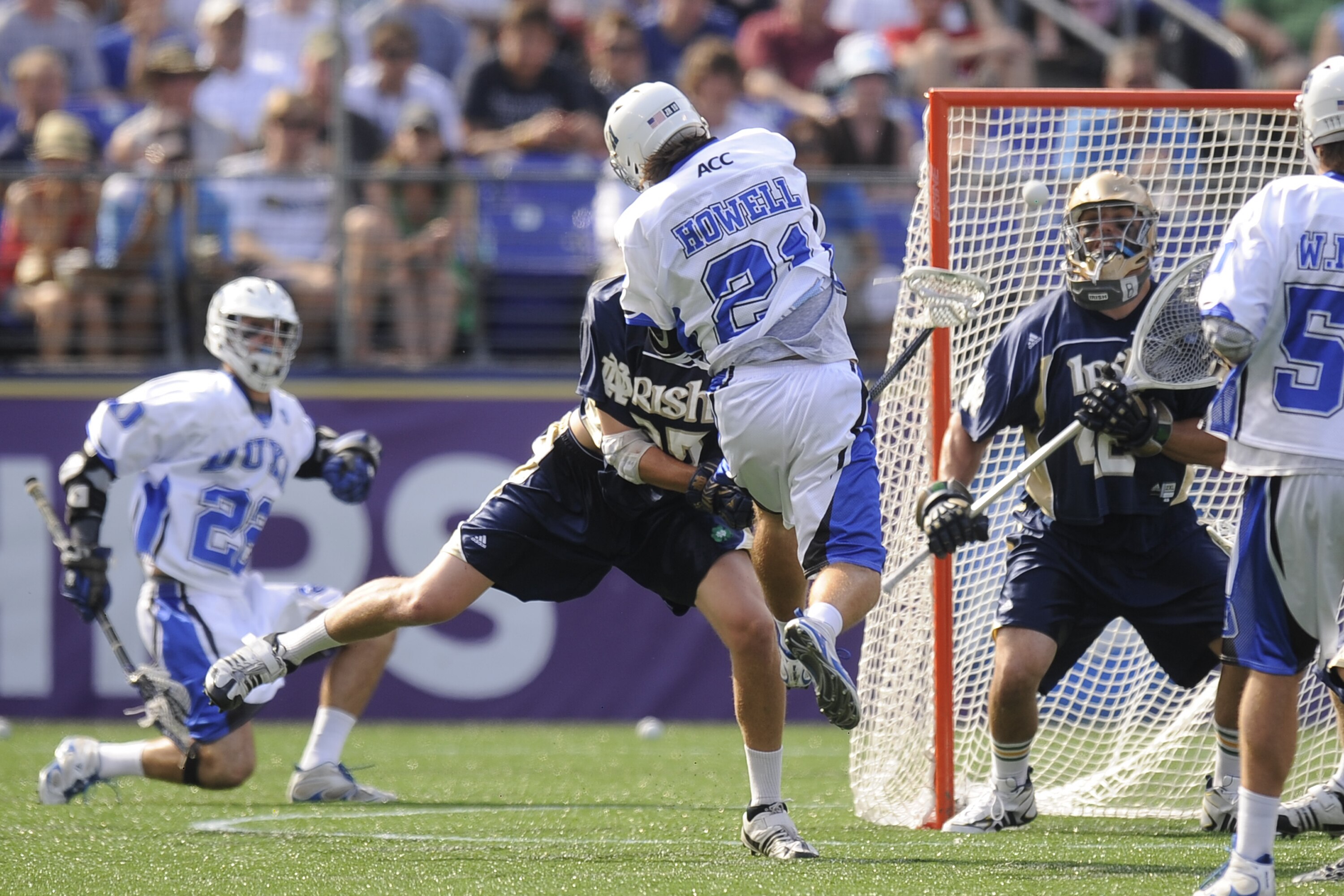 BALTIMORE, MD - MAY 31:  Zach Howell #21 of the Duke Blue Devils takes a shot against the Notre Dame Fighting Irish during the 2010 NCAA Division 1 Lacrosse Championship game on May 31, 2010 at M&T Bank Stadium in Baltimore, Maryland.  (Photo by Mitchell