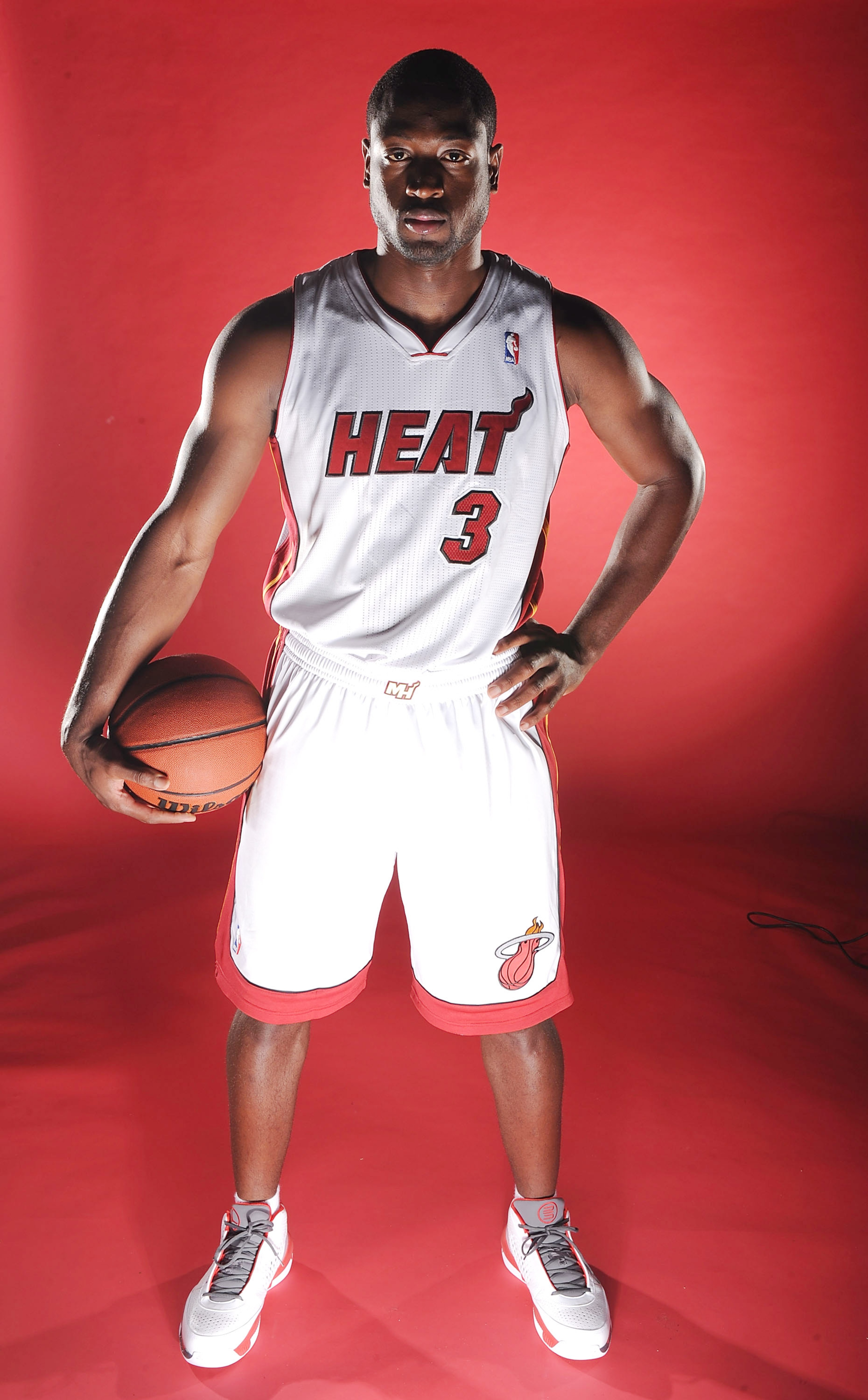 MIAMI - SEPTEMBER 27:  Dwyane Wade #3 of the Miami Heat pose for photos during media day at the Bank United Center on September 27, 2010 in Miami, Florida. NOTE TO USER: User expressly acknowledges and agrees that, by downloading and/or using this Photogr