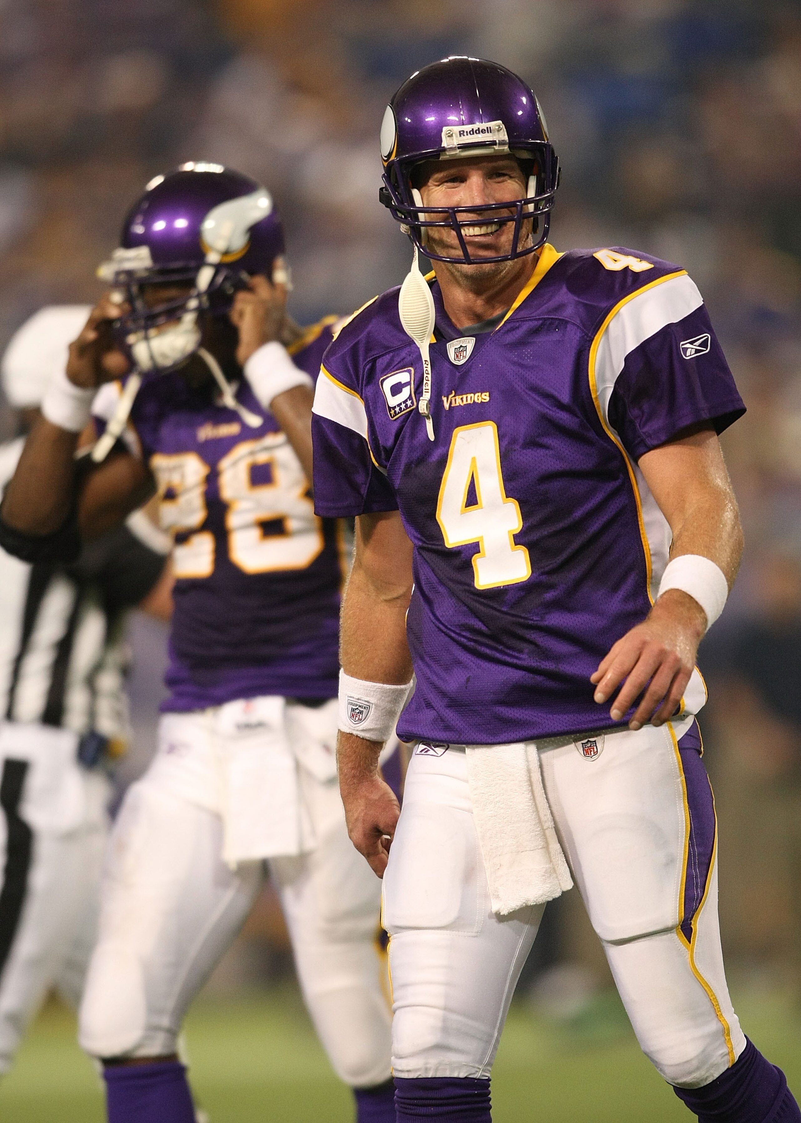 MINNEAPOLIS - NOVEMBER 22:  Brett Favre #4 of the Minnesota Vikings smiles as he walks from the field against the Seattle Seahawks at Hubert H. Humphrey Metrodome on November 22, 2009 in Minneapolis, Minnesota.  (Photo by Nick Laham/Getty Images)