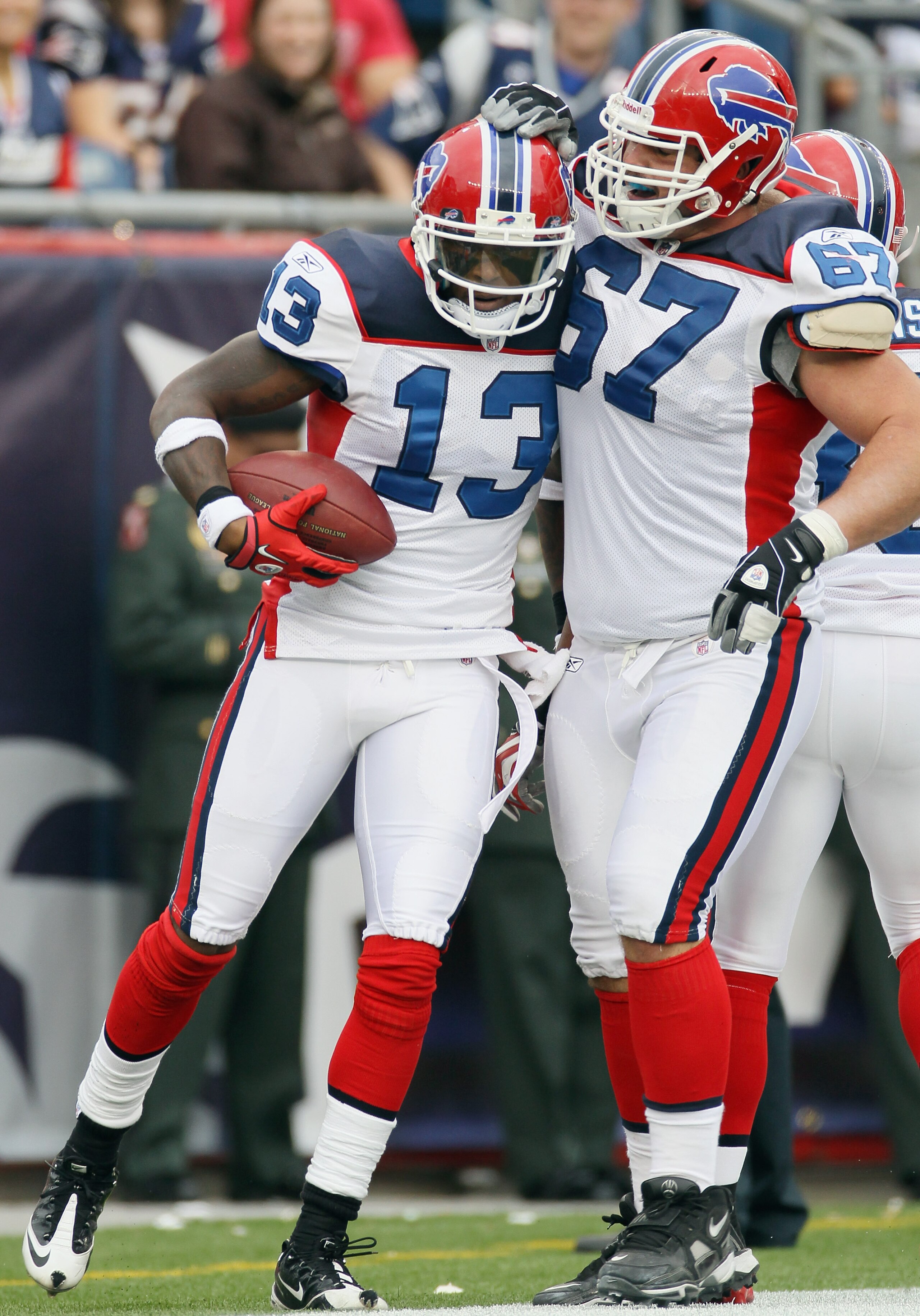 FOXBORO, MA - SEPTEMBER 26:  Steve Johnson #13 of the Buffalo Bills is congratulated by teammate Andy Levitre #67 after Johnson a touchdown against the New England Patriots during on September 26, 2010 at Gillette Stadium in Foxboro, Massachusetts. The Pa