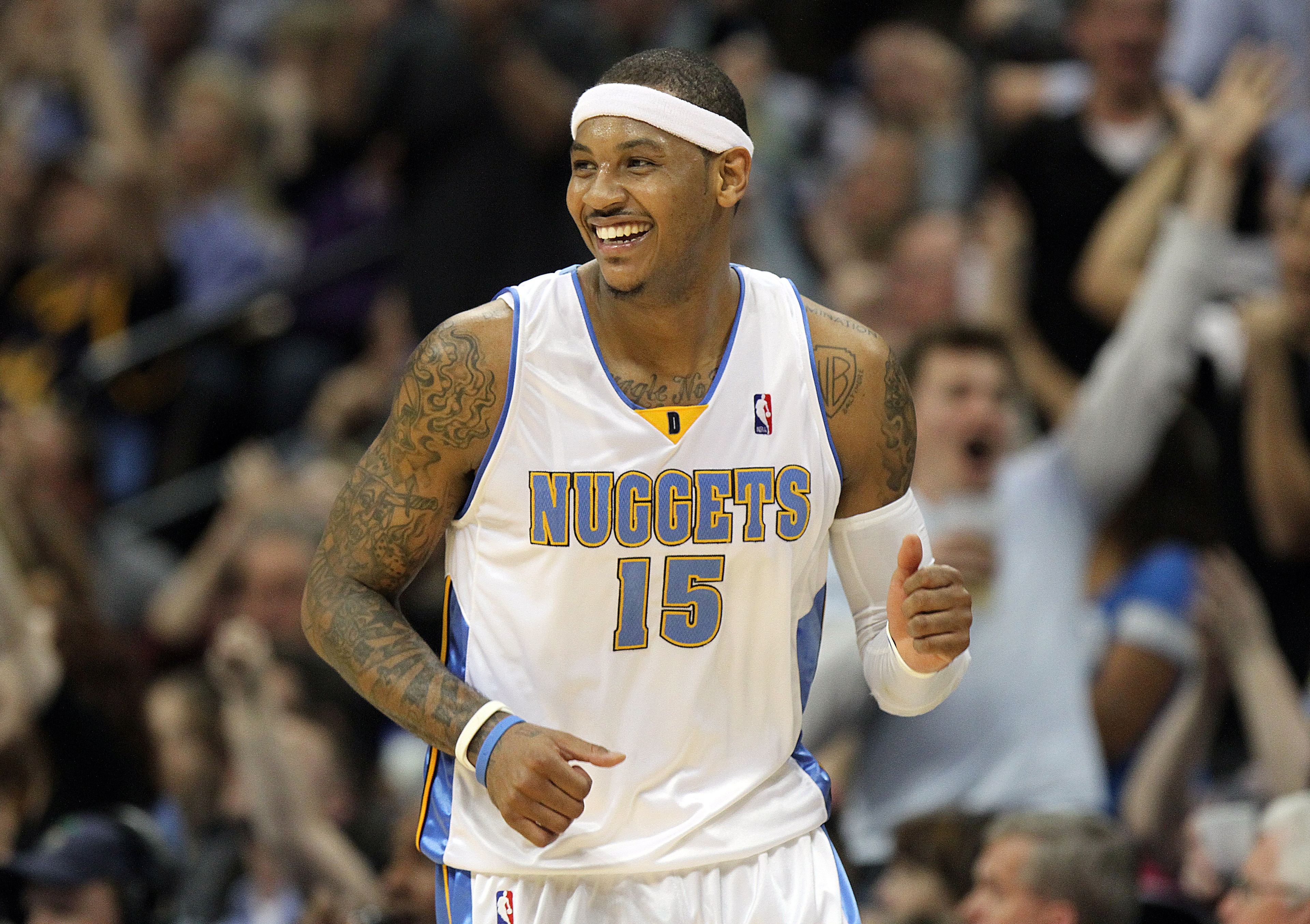DENVER, CO - APRIL 17 : Carmelo Anthony #15 of the Denver Nuggets celebrates after sinking a shot against the Utah Jazz during the second half of Game One of the Western Conference Quarterfinals of the 2010 NBA Playoffs at the Pepsi Center on April 17, 20