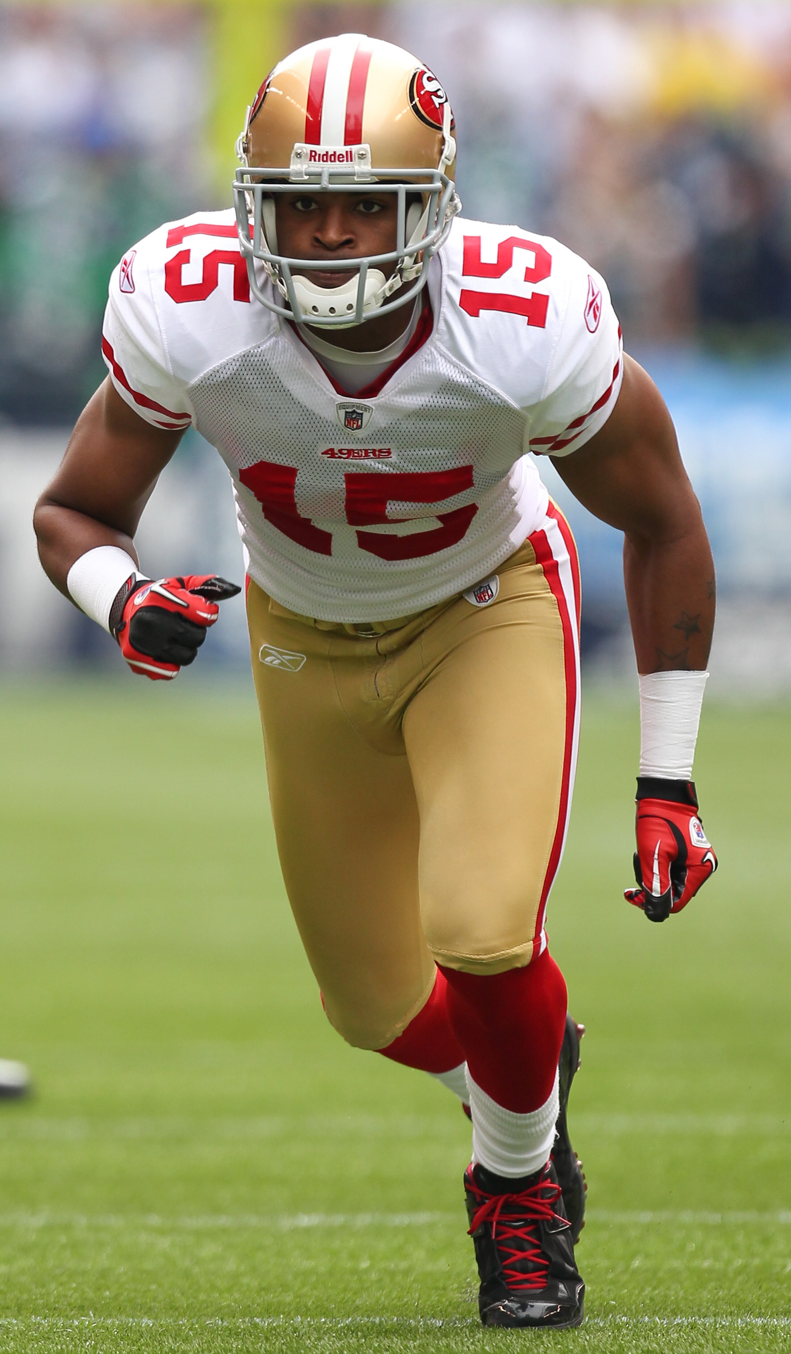 SEATTLE - SEPTEMBER 12:  Wide receiver Michael Crabtree #15 of the San Francisco 49ers runs a pass pattern during the NFL season opener against the Seattle Seahawks at Qwest Field on September 12, 2010 in Seattle, Washington. (Photo by Otto Greule Jr/Gett