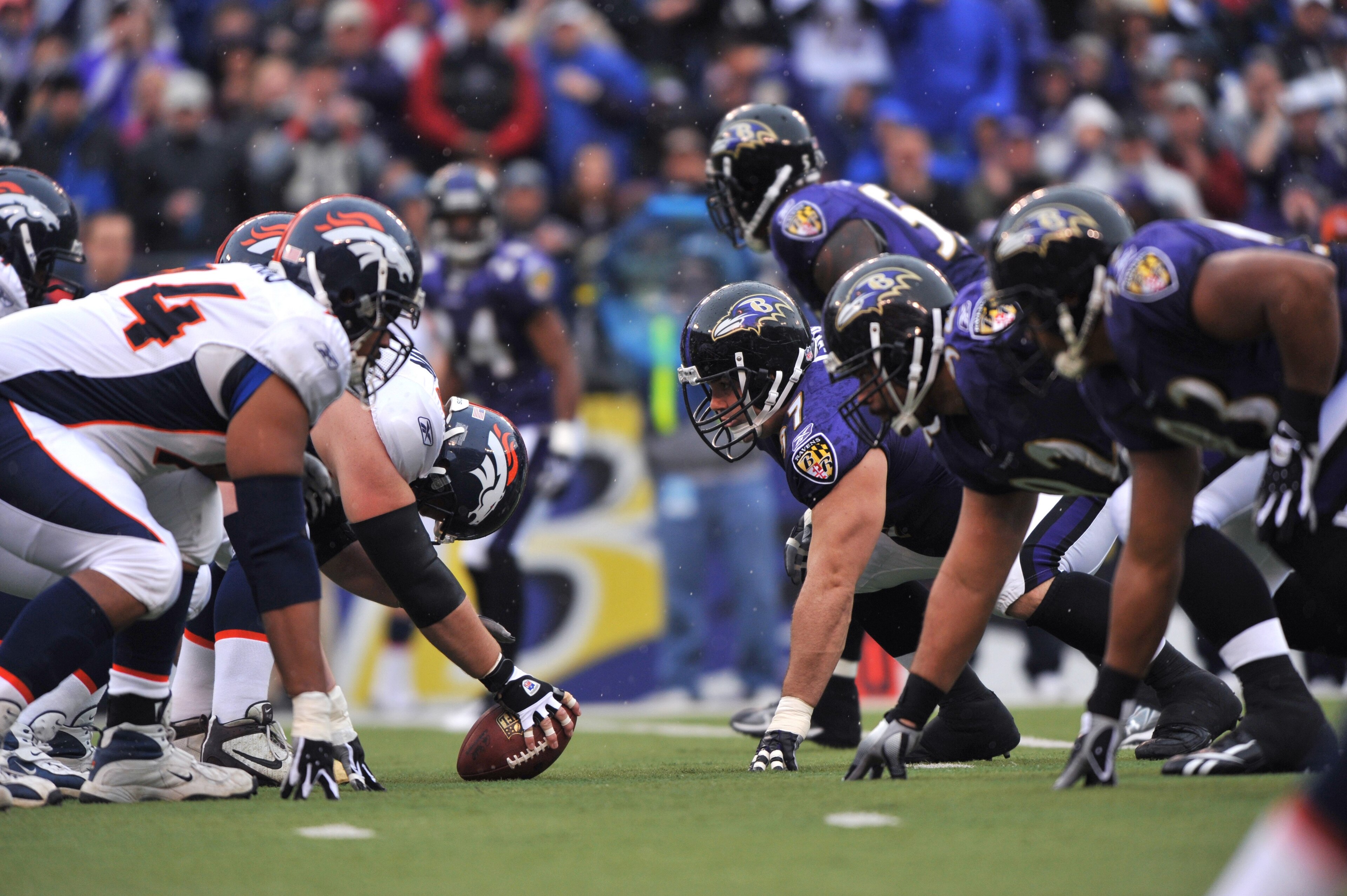BALTIMORE - NOVEMBER 1:  Casey Wiegmann #62 of the Denver Broncos snaps the ball during the game against the Baltimore Ravens at M&T Bank Stadium on November 1, 2009 in Baltimore, Maryland. The Ravens defeated the Broncos 30-7. (Photo by Larry French/Gett