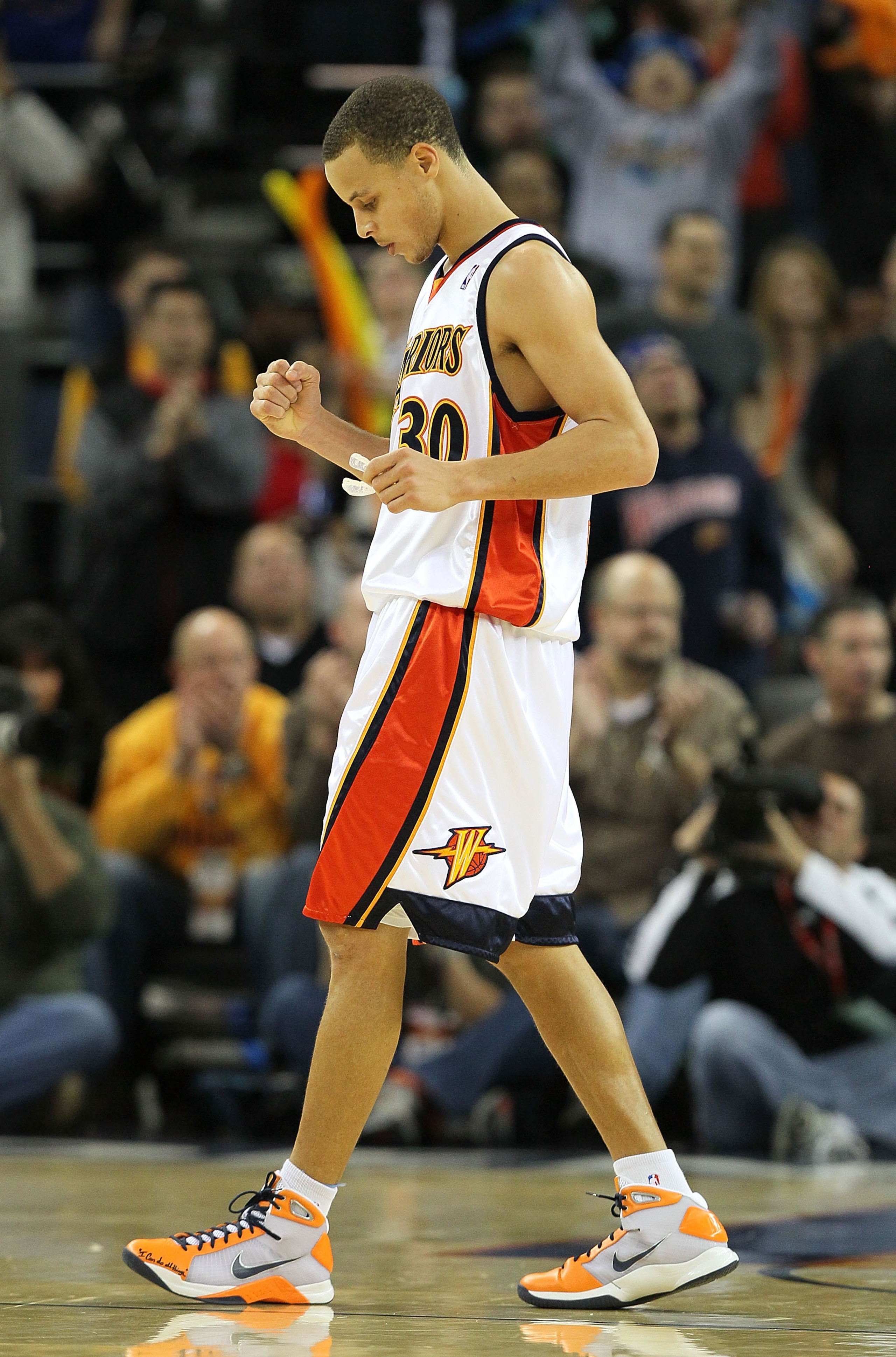 OAKLAND, CA - FEBRUARY 21:  Stephen Curry #30 of the Golden State Warriors celebrates against the Atlanta Hawks during an NBA game at Oracle Arena on February 21, 2010 in Oakland, California.  NOTE TO USER: User expressly acknowledges and agrees that, by